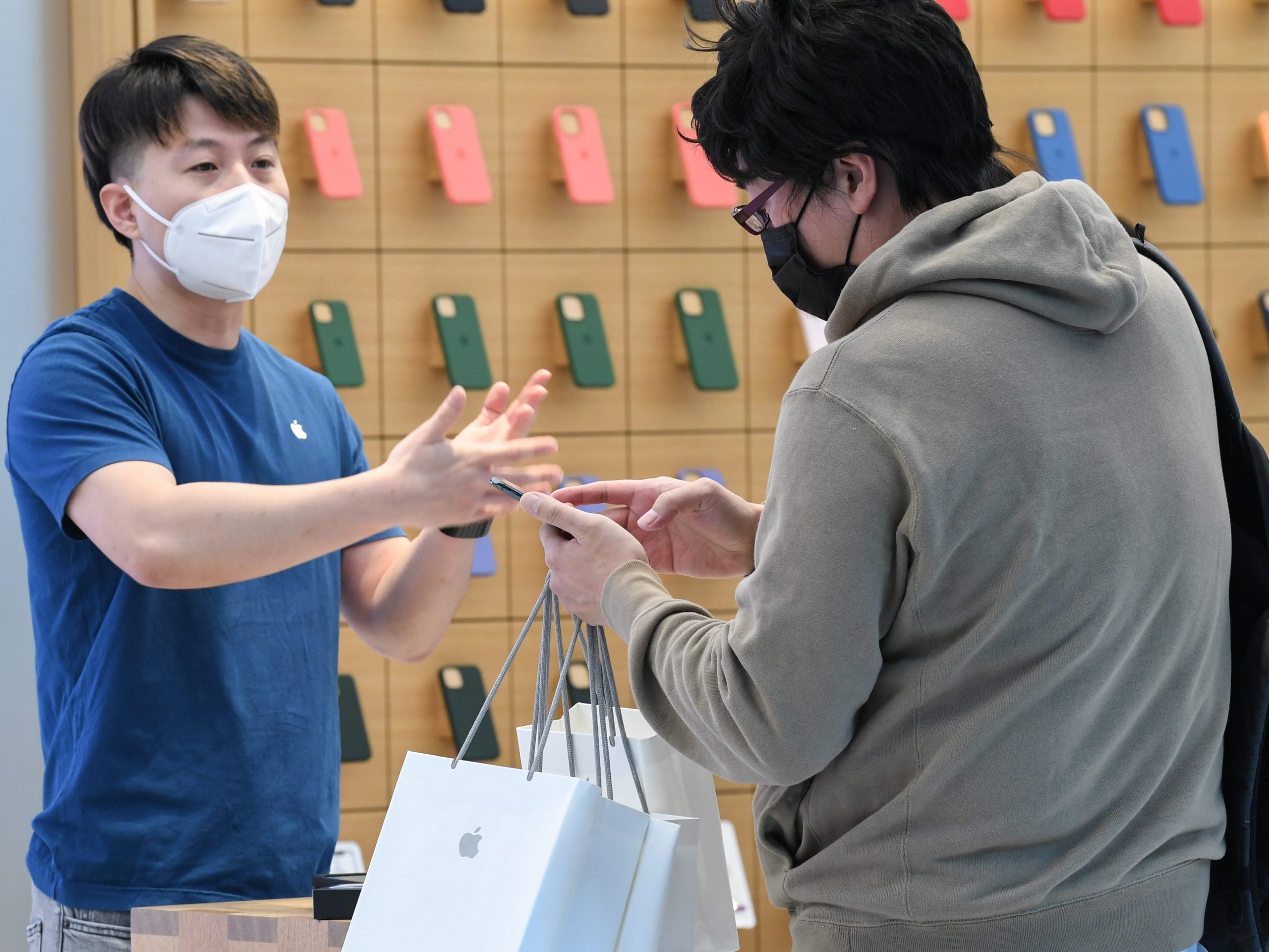 An Apple staff member inside an Apple Store on September 24, 2021 in Sydney, Australia.
