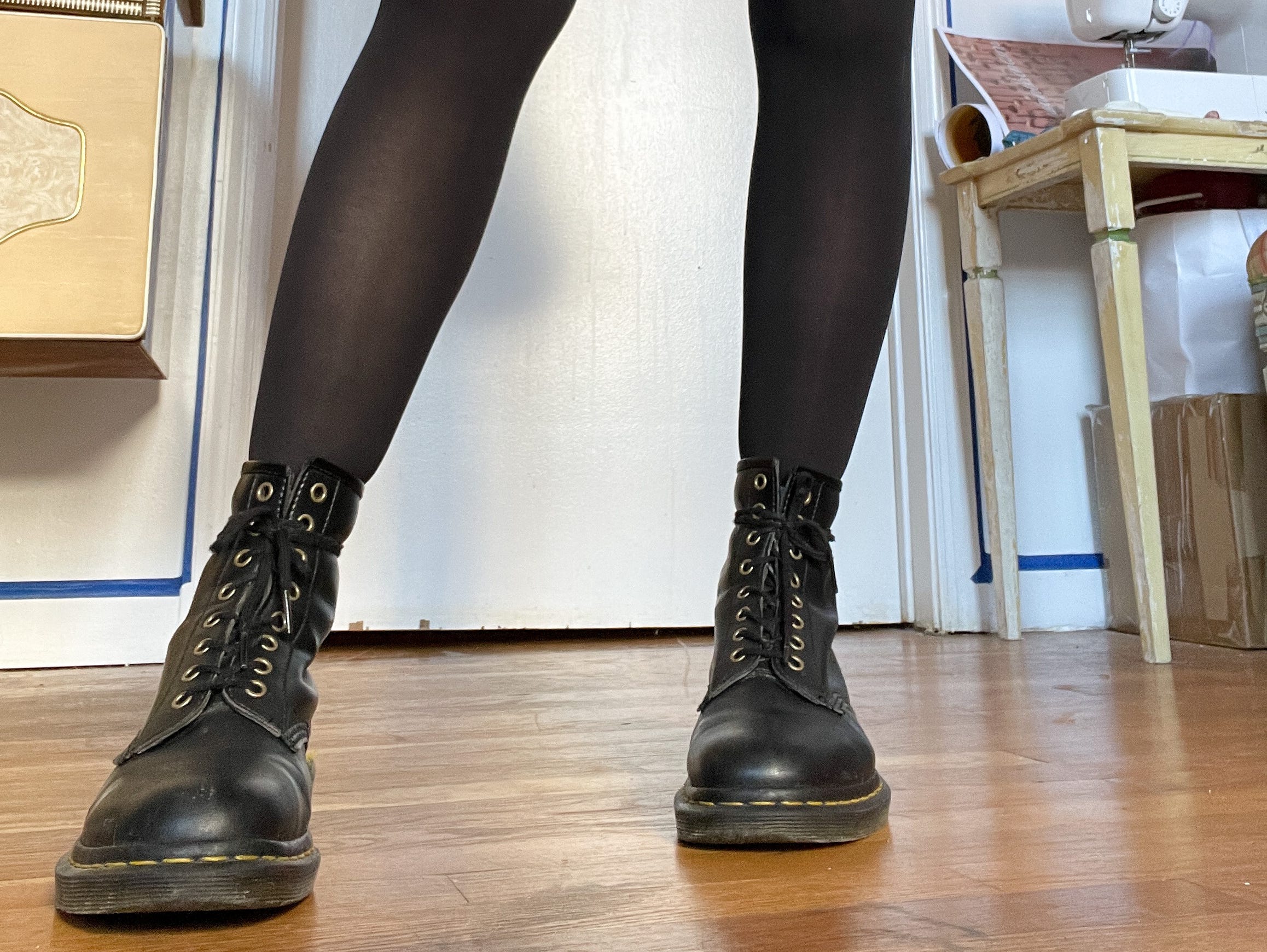 The writer's Doc Martens with black tights