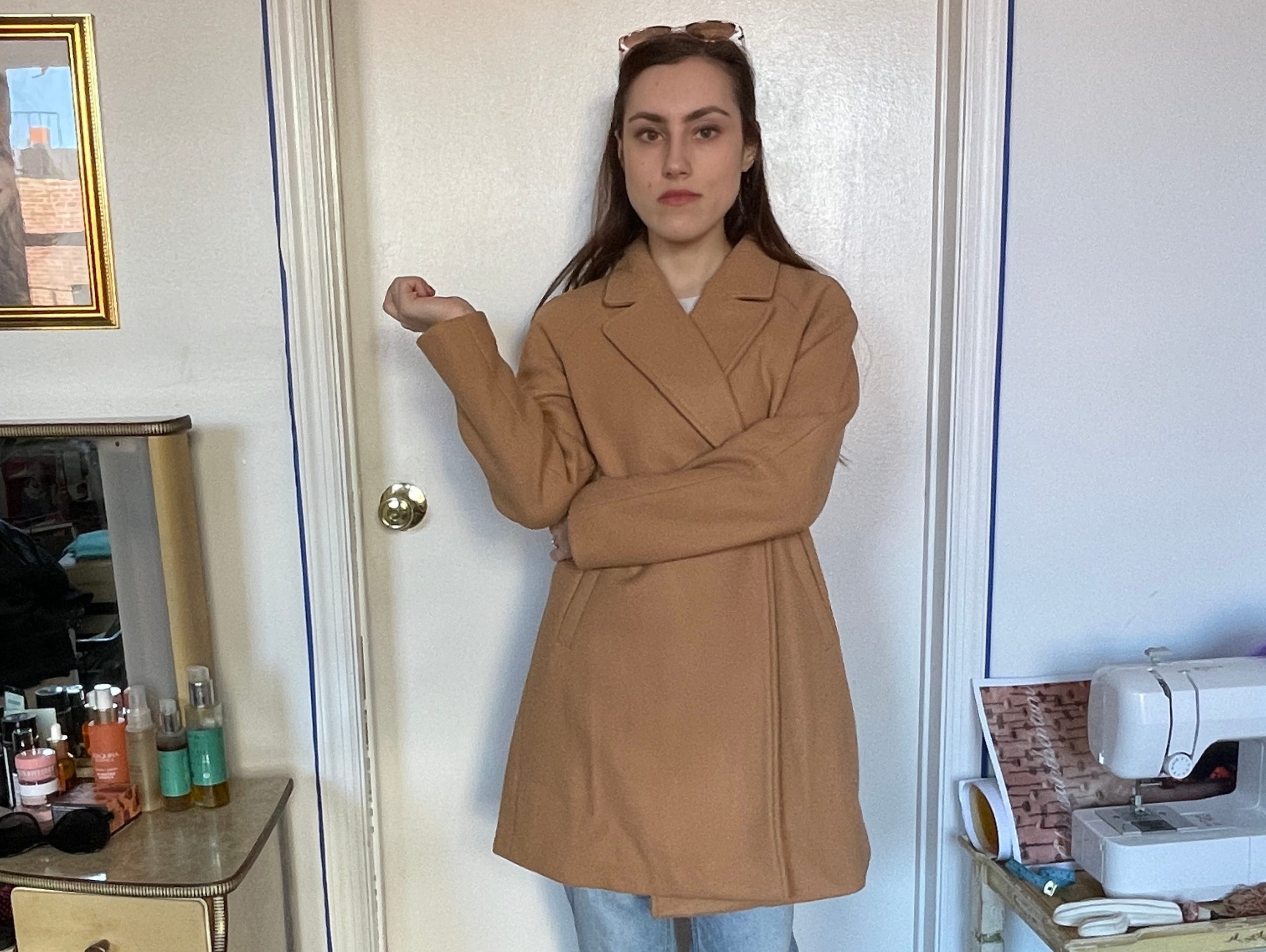 The writer wrapped in her camel-colored coat