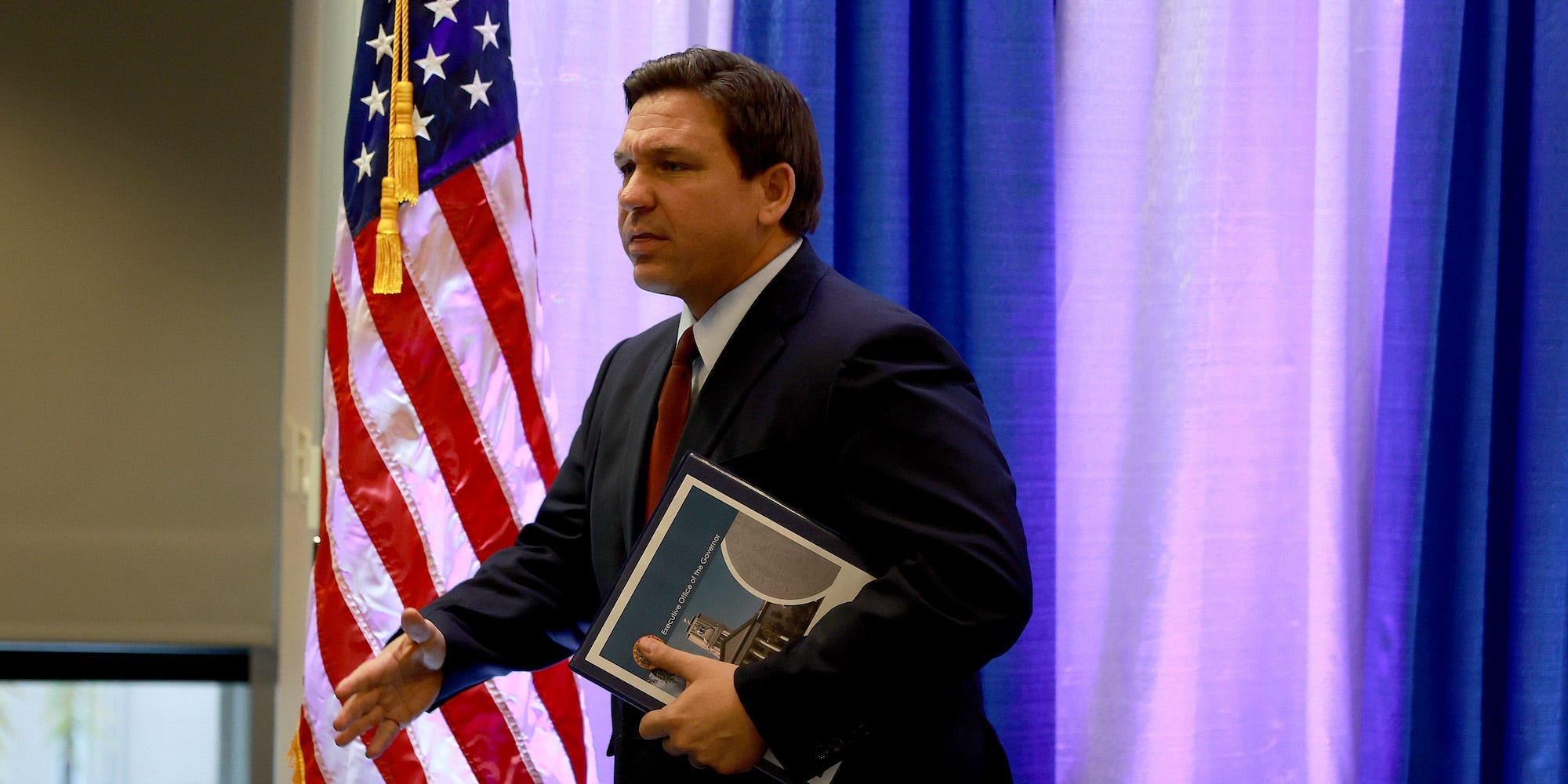 Florida Gov. Ron DeSantis leaves after holding a press conference at the Miami Dade College’s North Campus on January 26, 2022 in Miami, Florida.