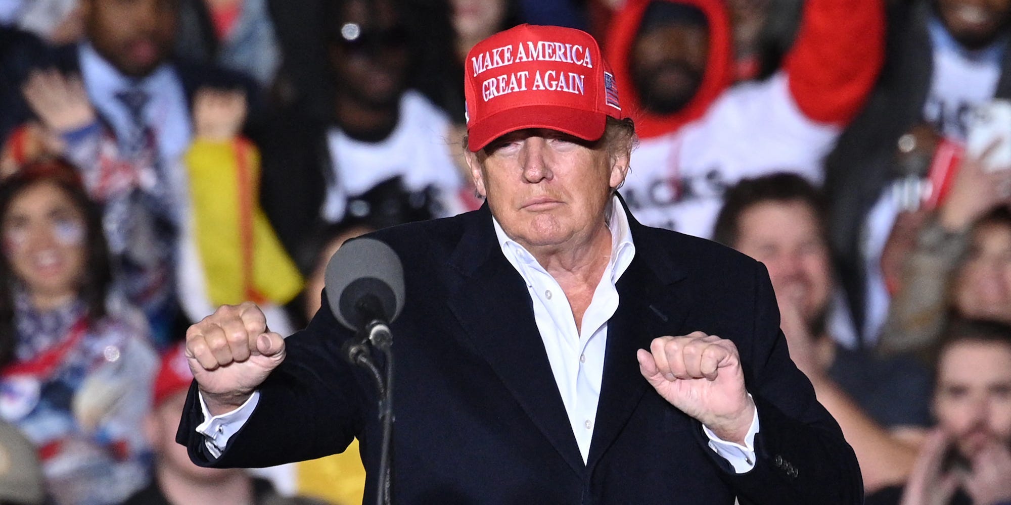 Former US President Donald Trump gestures as he speaks during a rally at the Canyon Moon Ranch festival grounds in Florence, Arizona, on January 15, 2022.