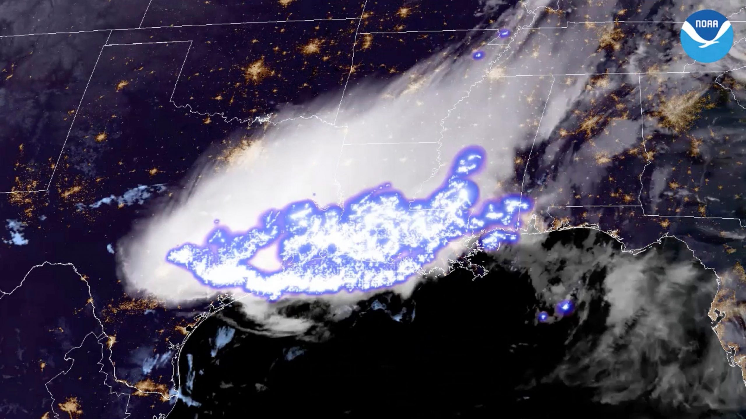 satellite image shows lightning flash spreading from texas to mississippi in storm clouds