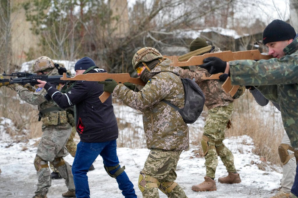 Members of Ukraine's Territorial Defense Forces, volunteer military units of the Armed Forces, train close to Kyiv, Ukraine, Saturday, Jan. 29, 2022