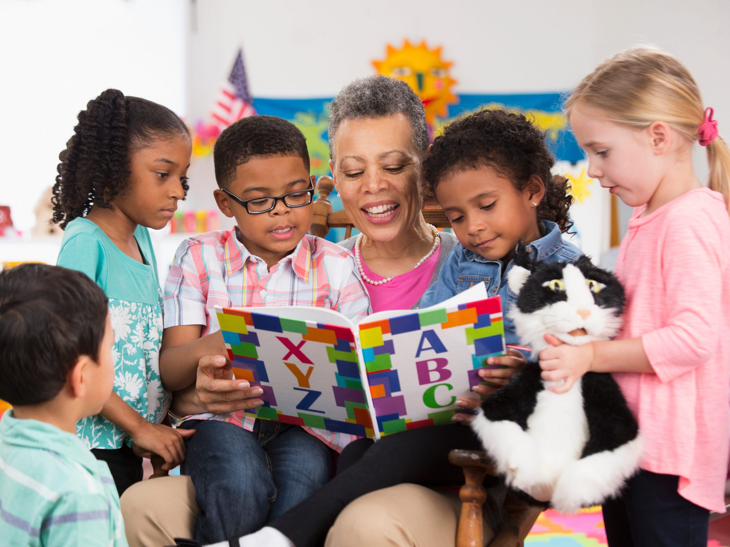 A teacher reading to children