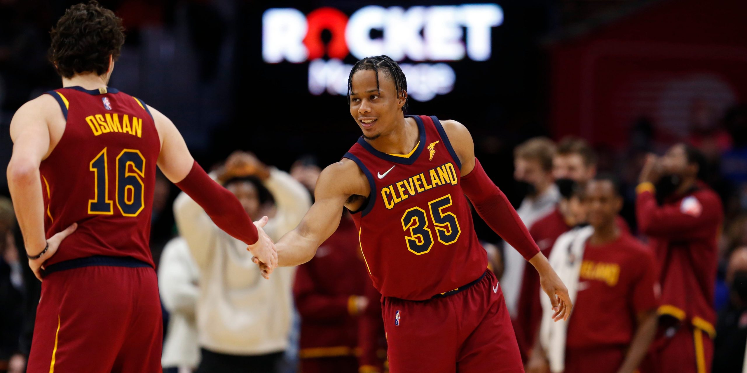 CLEVELAND, OH - JANUARY 31: Isaac Okoro #35 of the Cleveland Cavaliers high fives team mate during the game against New Orleans Pelicans on January 31, 2022 at Rocket Mortgage FieldHouse in Cleveland, Ohio.