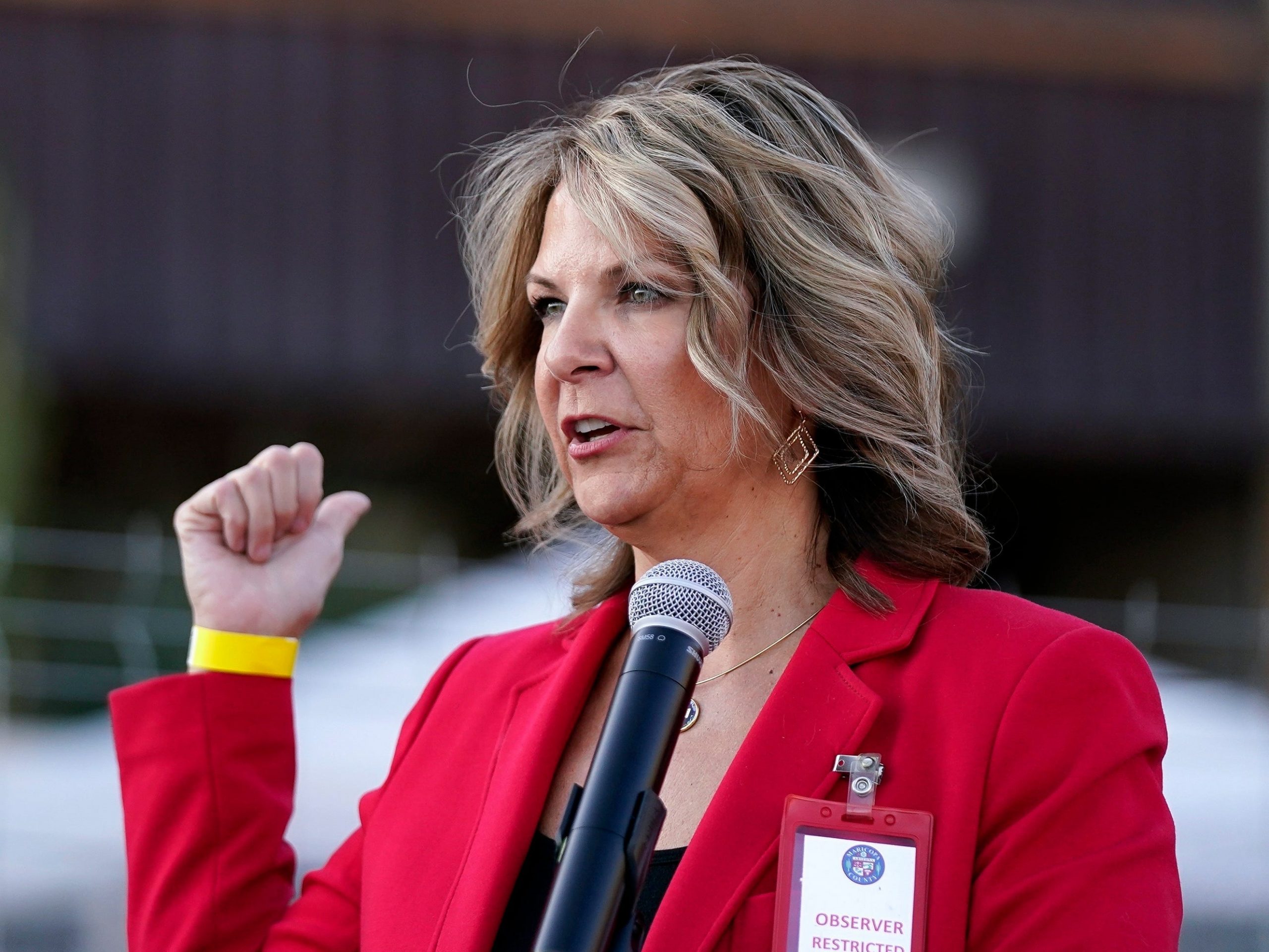 In this Nov. 18, 2020, file photo, Dr. Kelli Ward, chair of the Arizona Republican Party, holds a press conference in Phoenix.