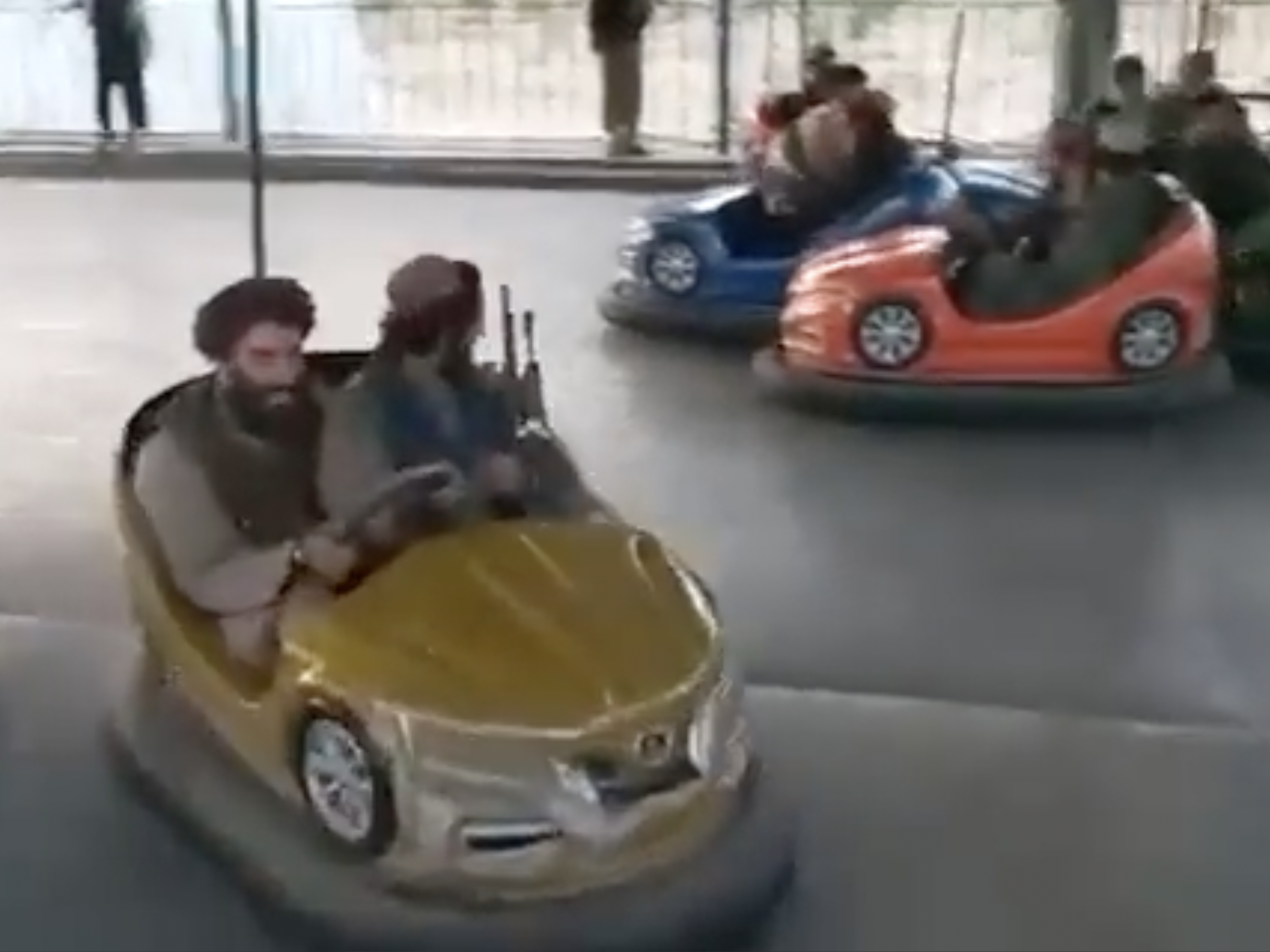 Screenshot of Twitter Video showing Taliban enjoying amusement park rides