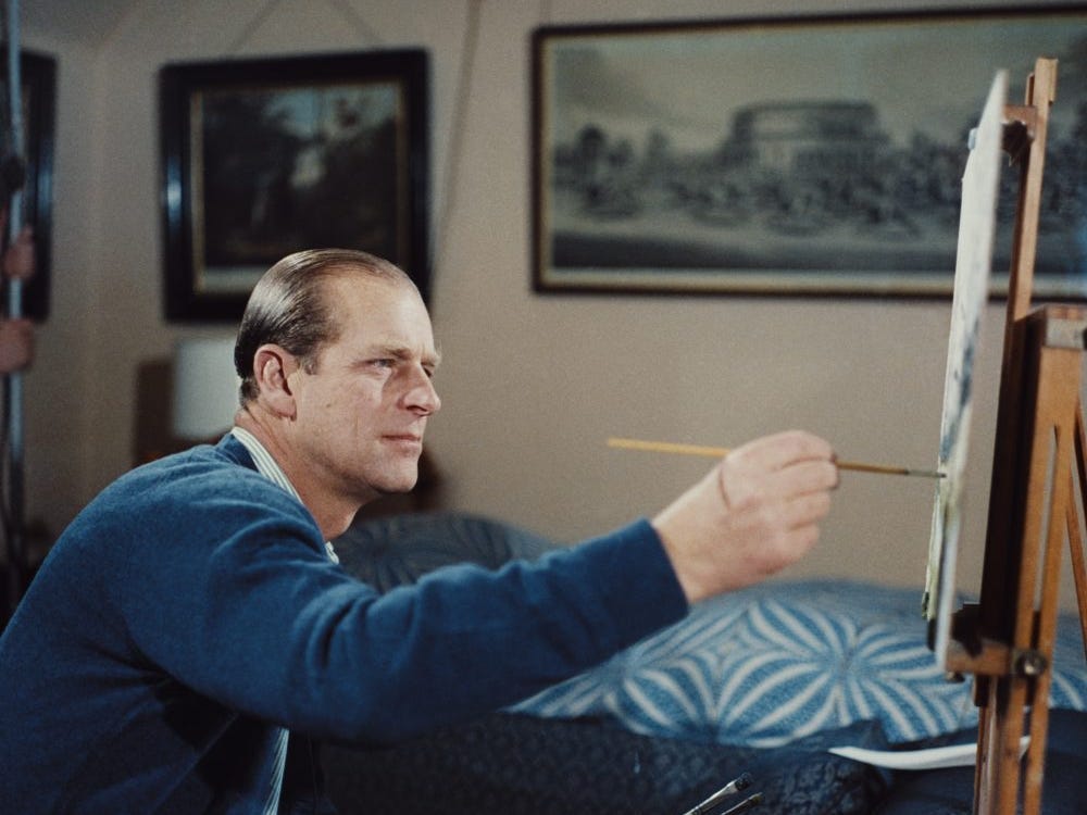 Prince Philip, Duke of Edinburgh, pictured painting with oil colors at an easel during filming of the television documentary 'Royal Family' in London in 1969.