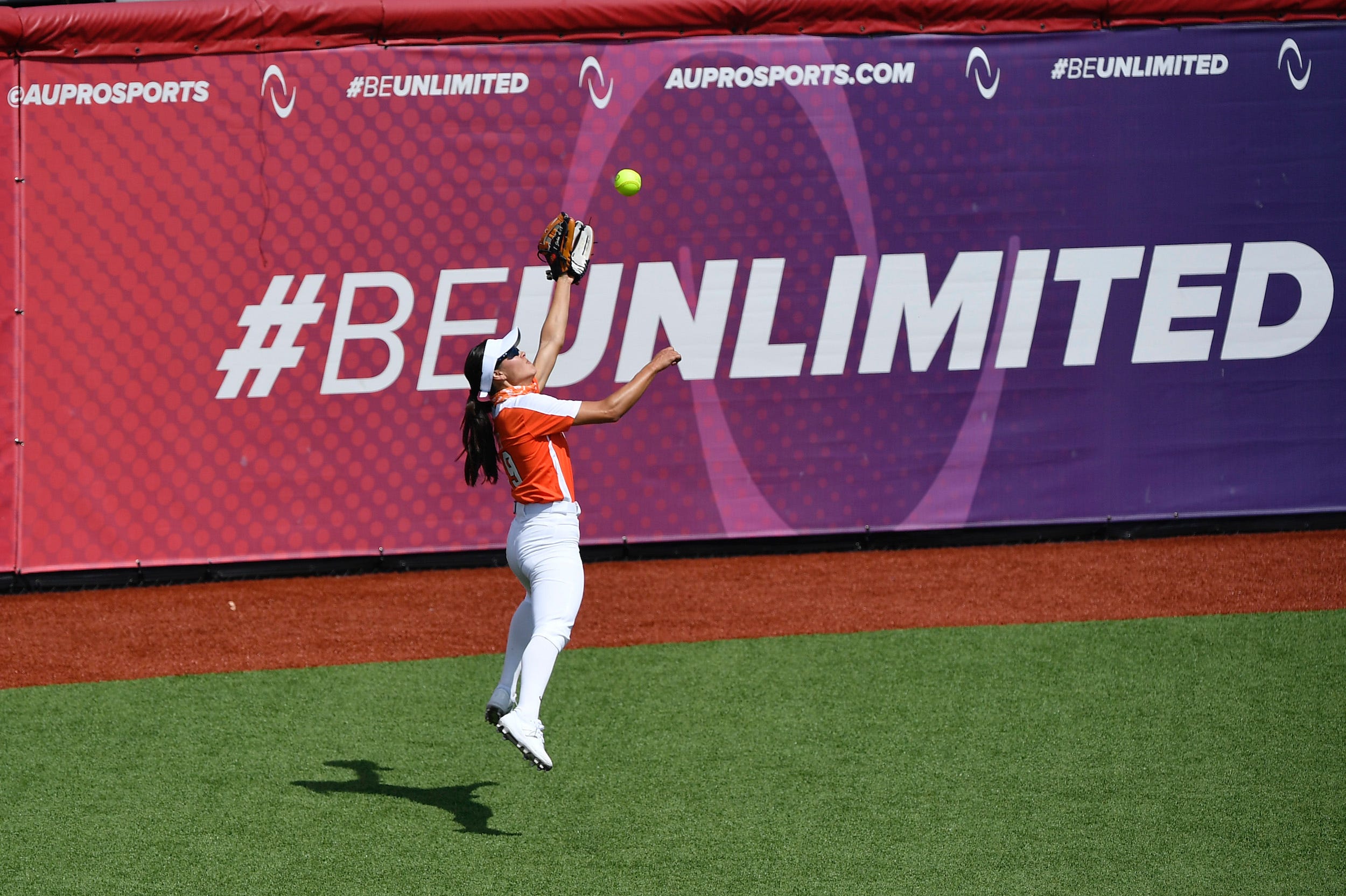 AU softball player Janie Reed leaps for a catch.