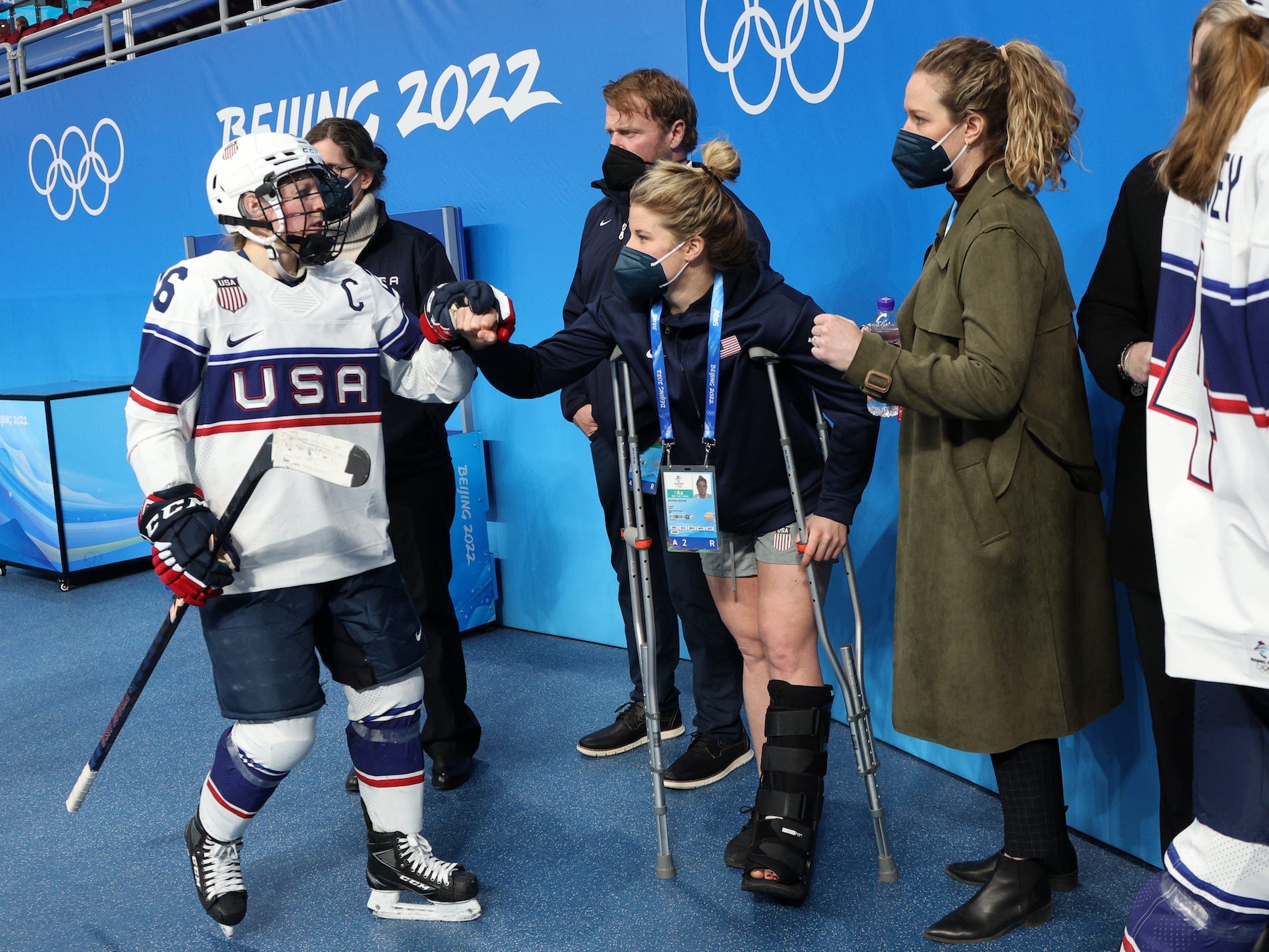 Brianna Decker wears a boot after sustaining a brutal lower-leg injury.