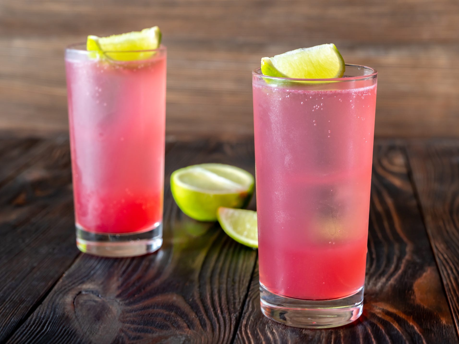 Two el diablo cocktails garnished with lime wedges