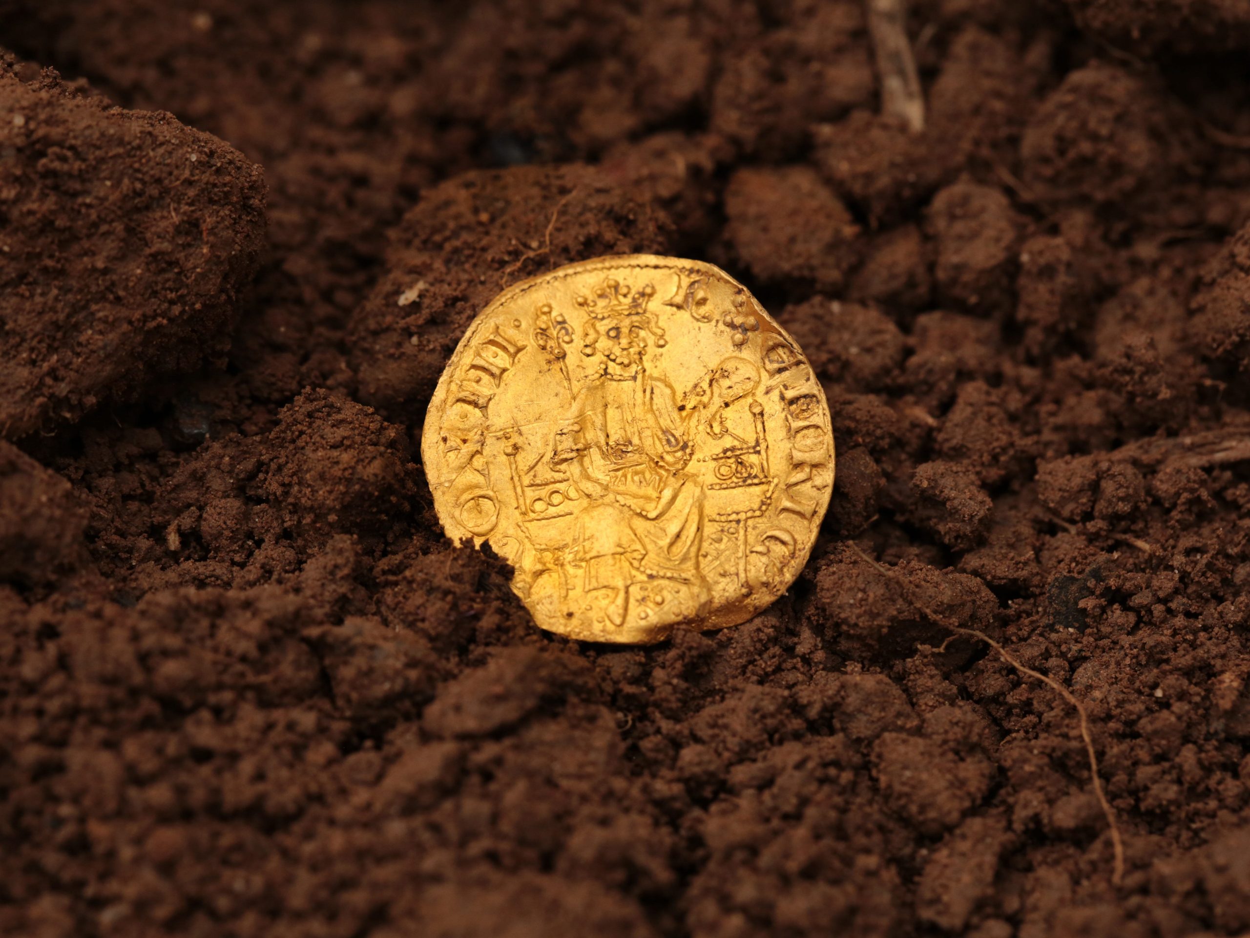 The gold coin found by the father of two, which dates back to the thirteen century.