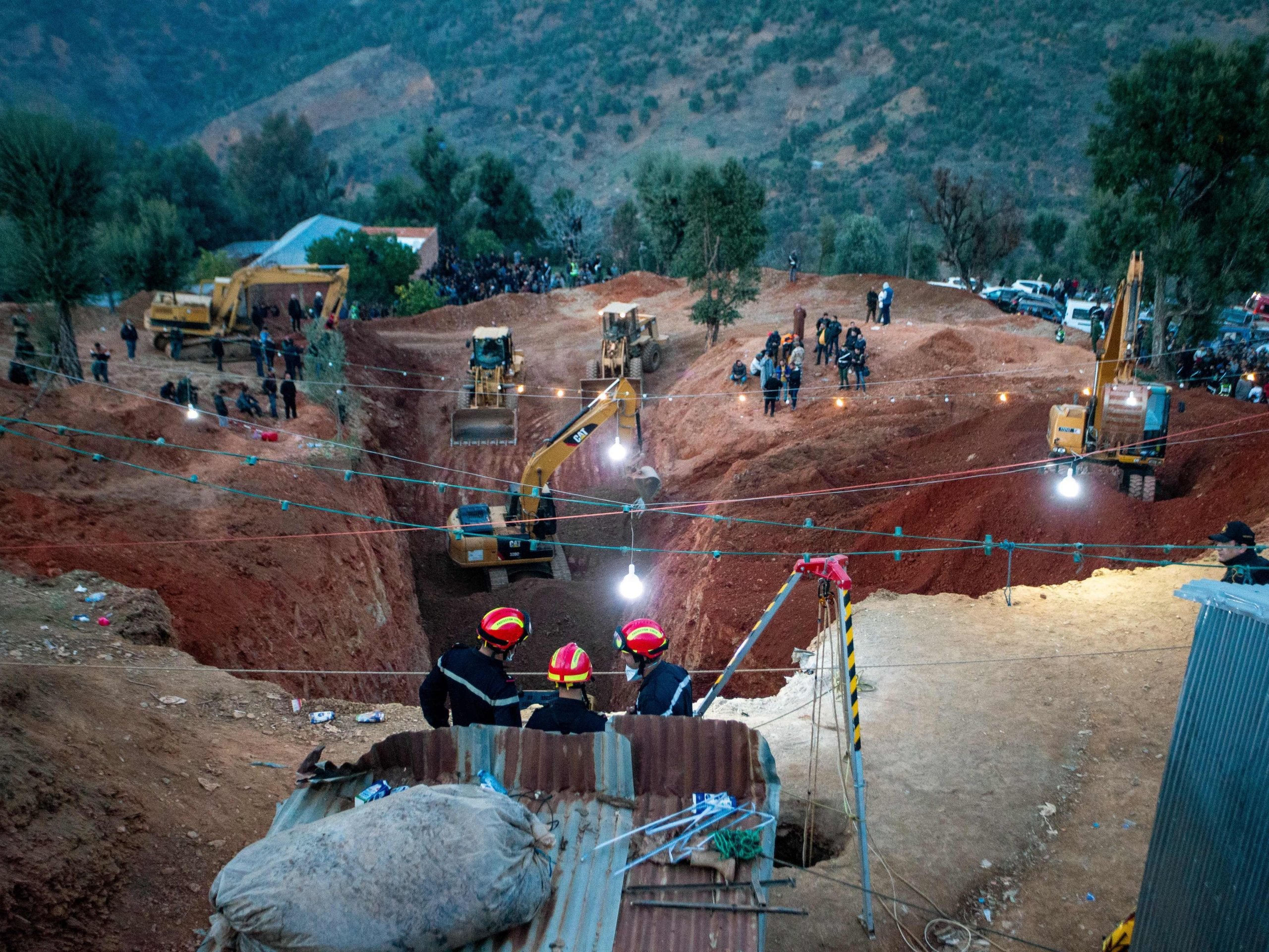 Rescuers attempt to free Rayan from a well in Morocco.