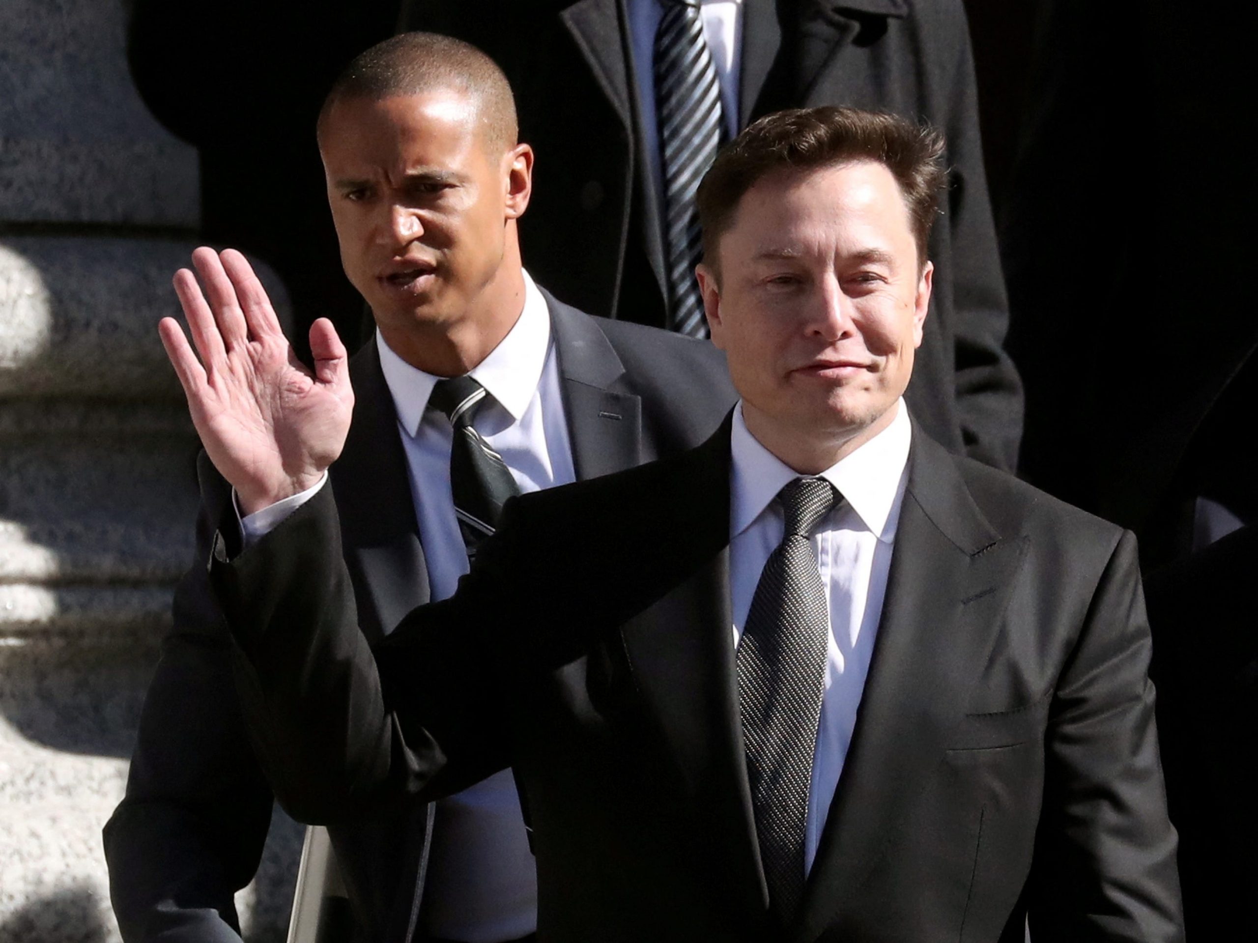 Tesla CEO Elon Musk waving.