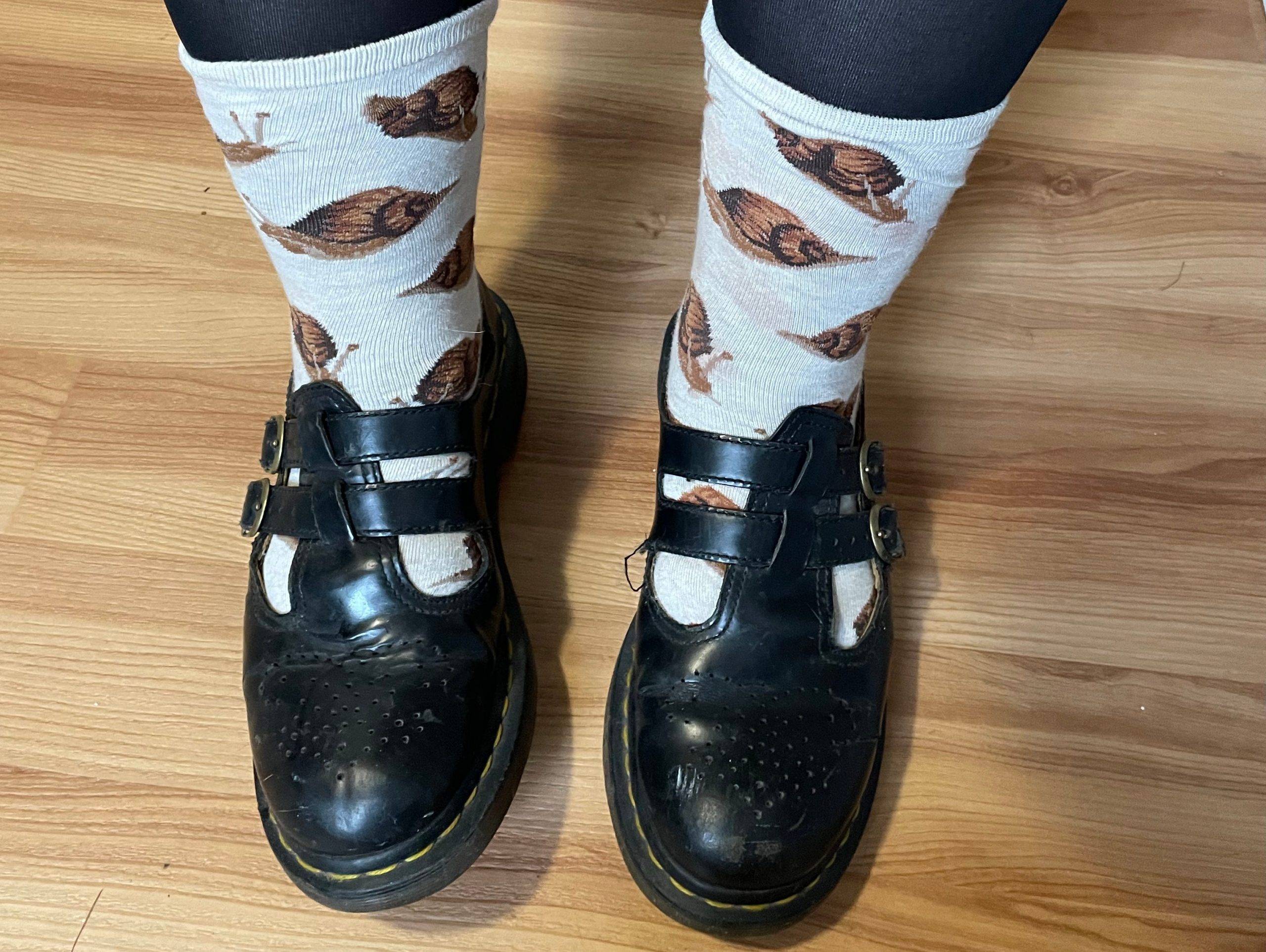 The writer wears Mary Janes and snail socks