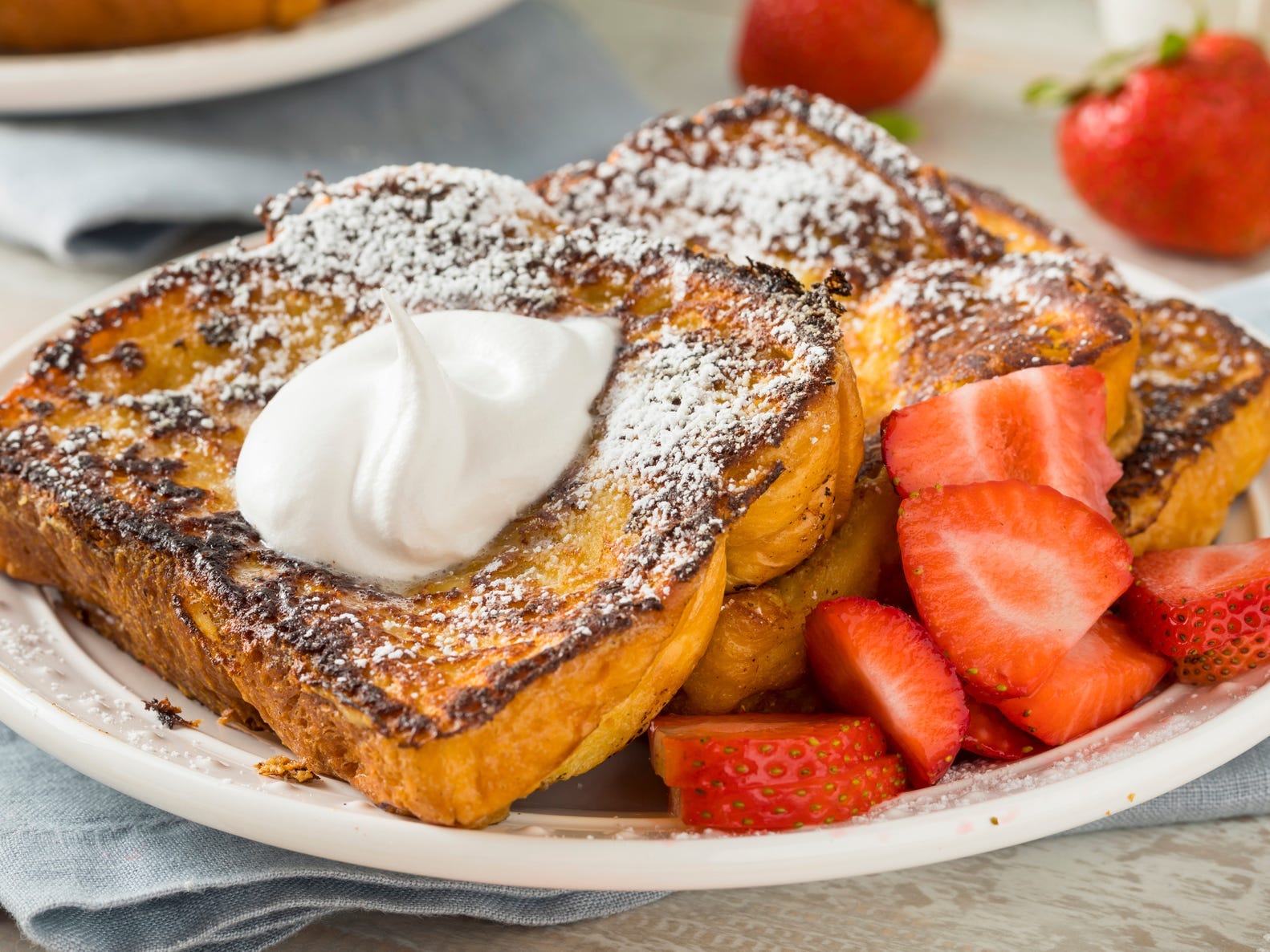 French toast with strawberries and whipped cream