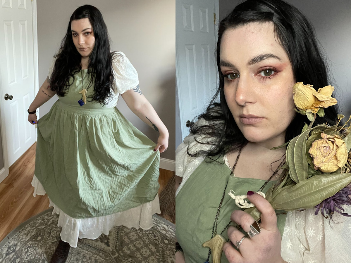 Writer in white dress and green apron