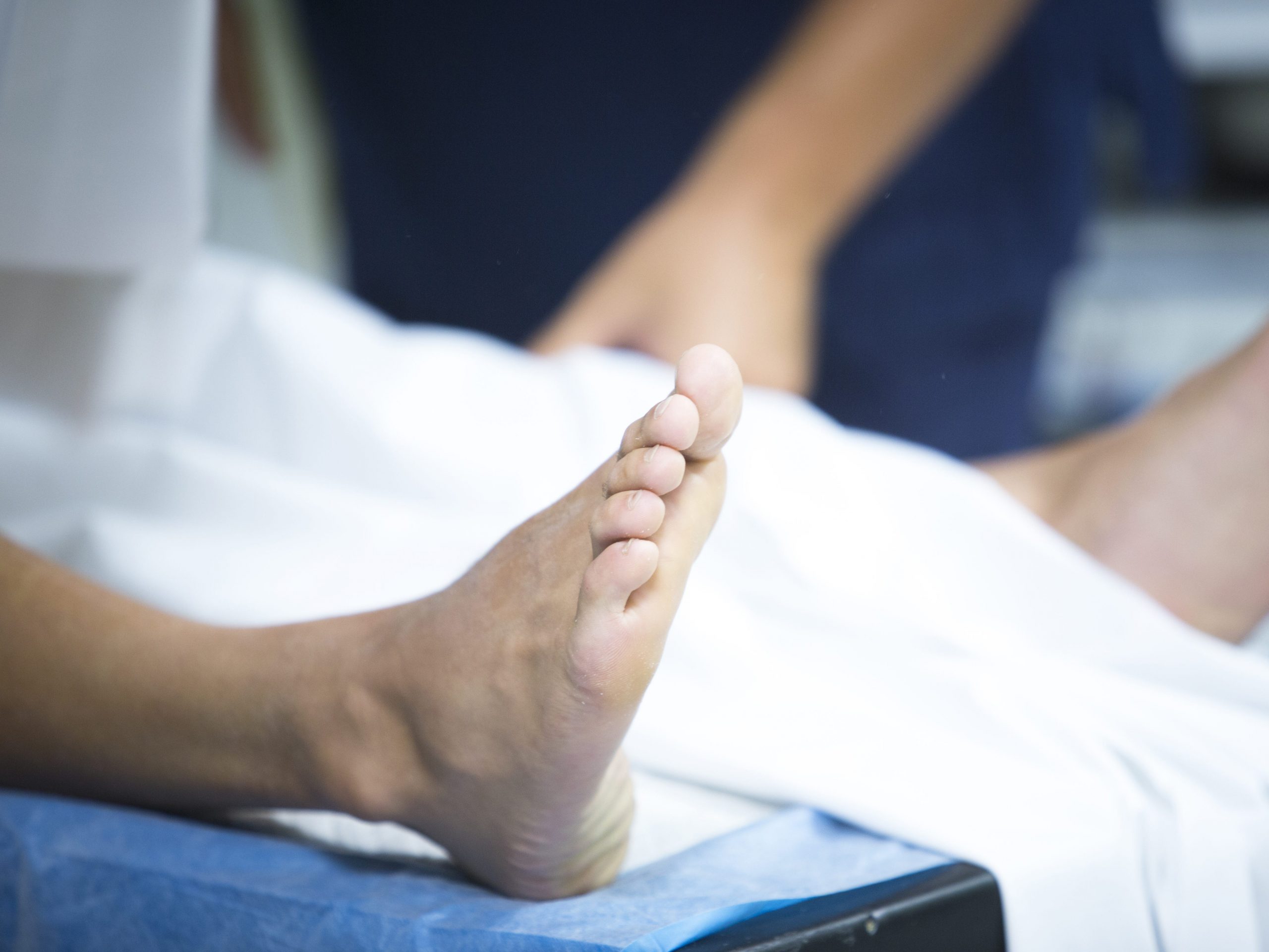 feet in hospital bed