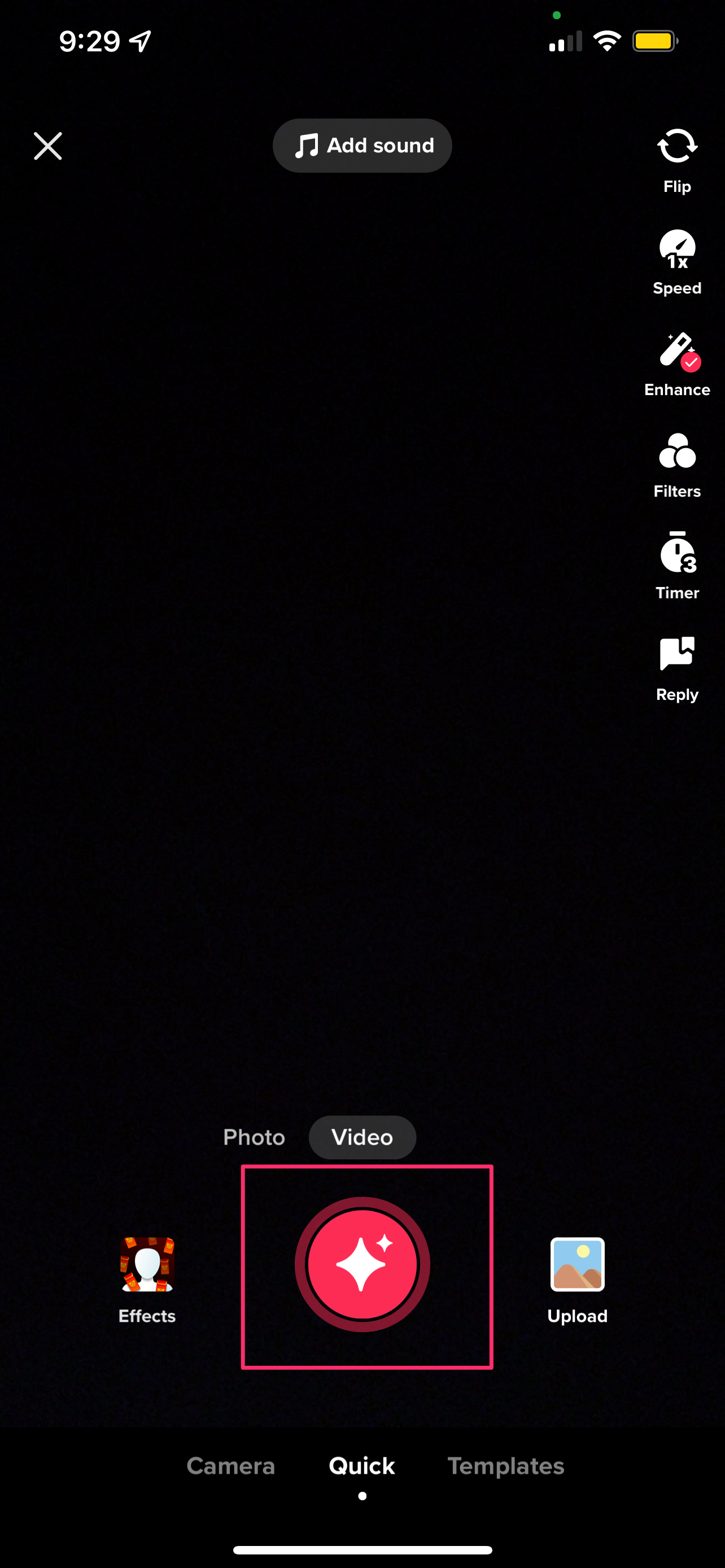 The TikTok app with the record button highlighted.