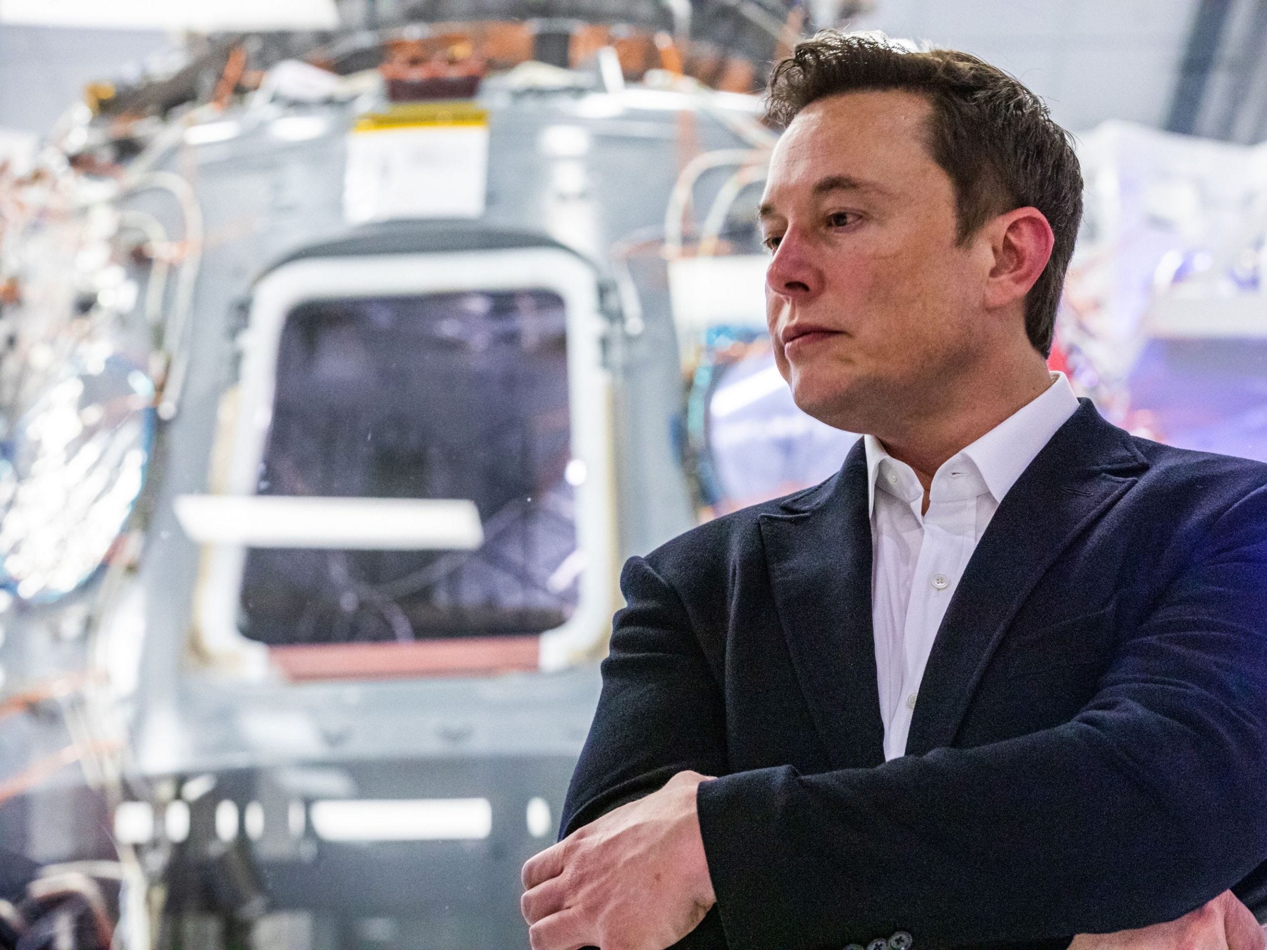 SpaceX founder Elon Musk addresses members of the media during a press conference announcing new developments of the Crew Dragon reusable spacecraft, at SpaceX headquarters in Hawthorne, California on October 10, 2019.