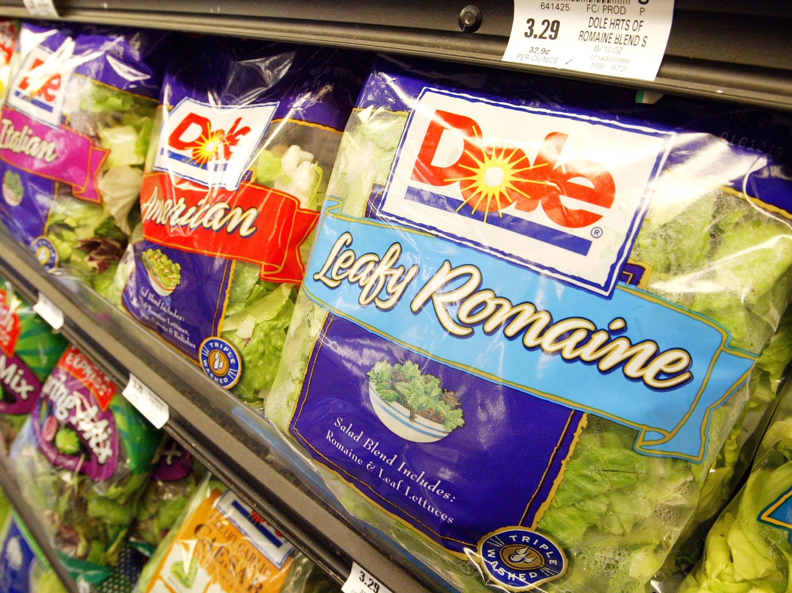 An image of Dole salads in a supermarket.