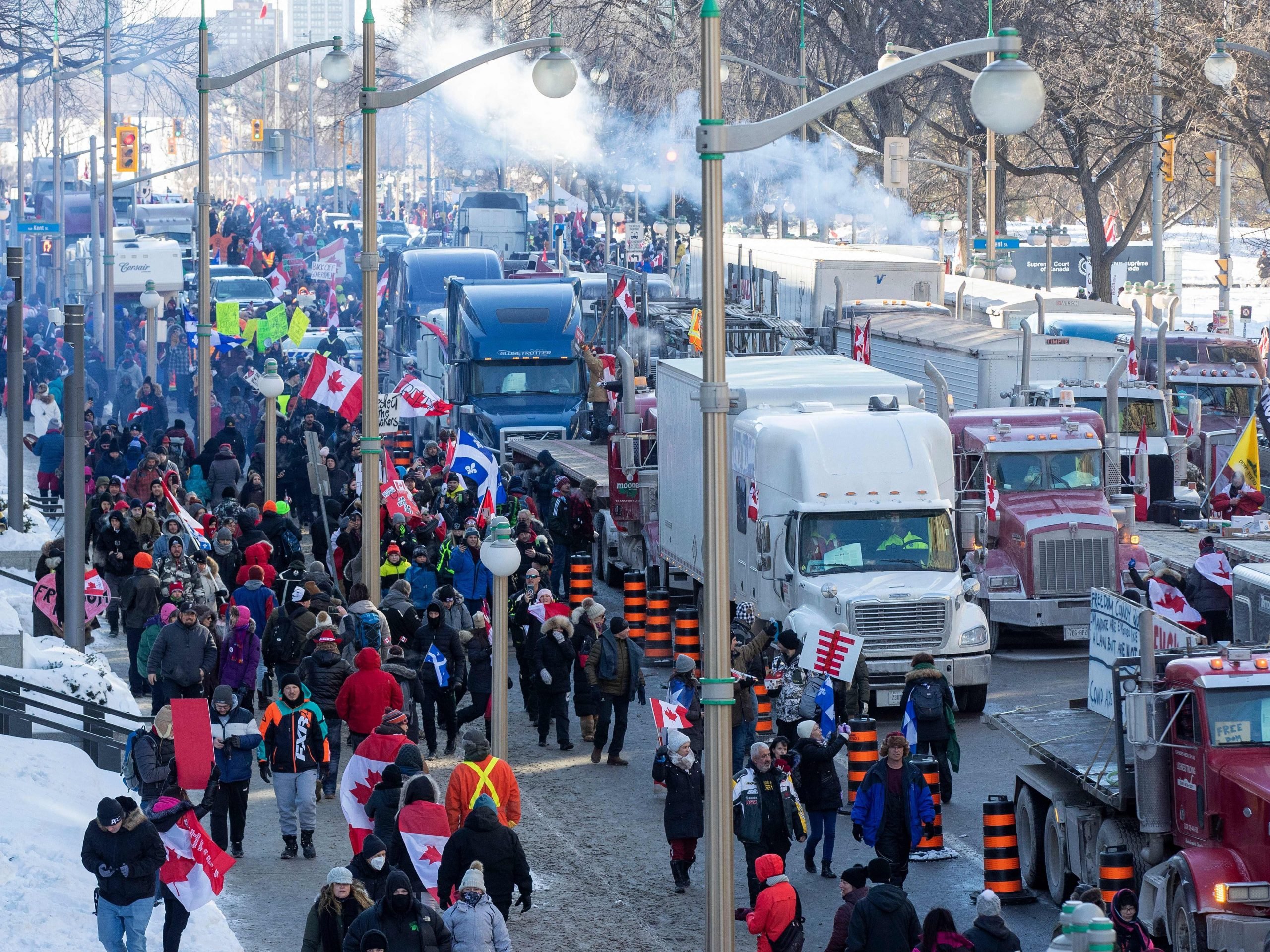 Supporters and trucks fill the street at Parliament Hill for the Freedom Truck Convoy to protest against Covid-19 vaccine mandates and restrictions in Ottawa, Canada, on January 29, 2022.