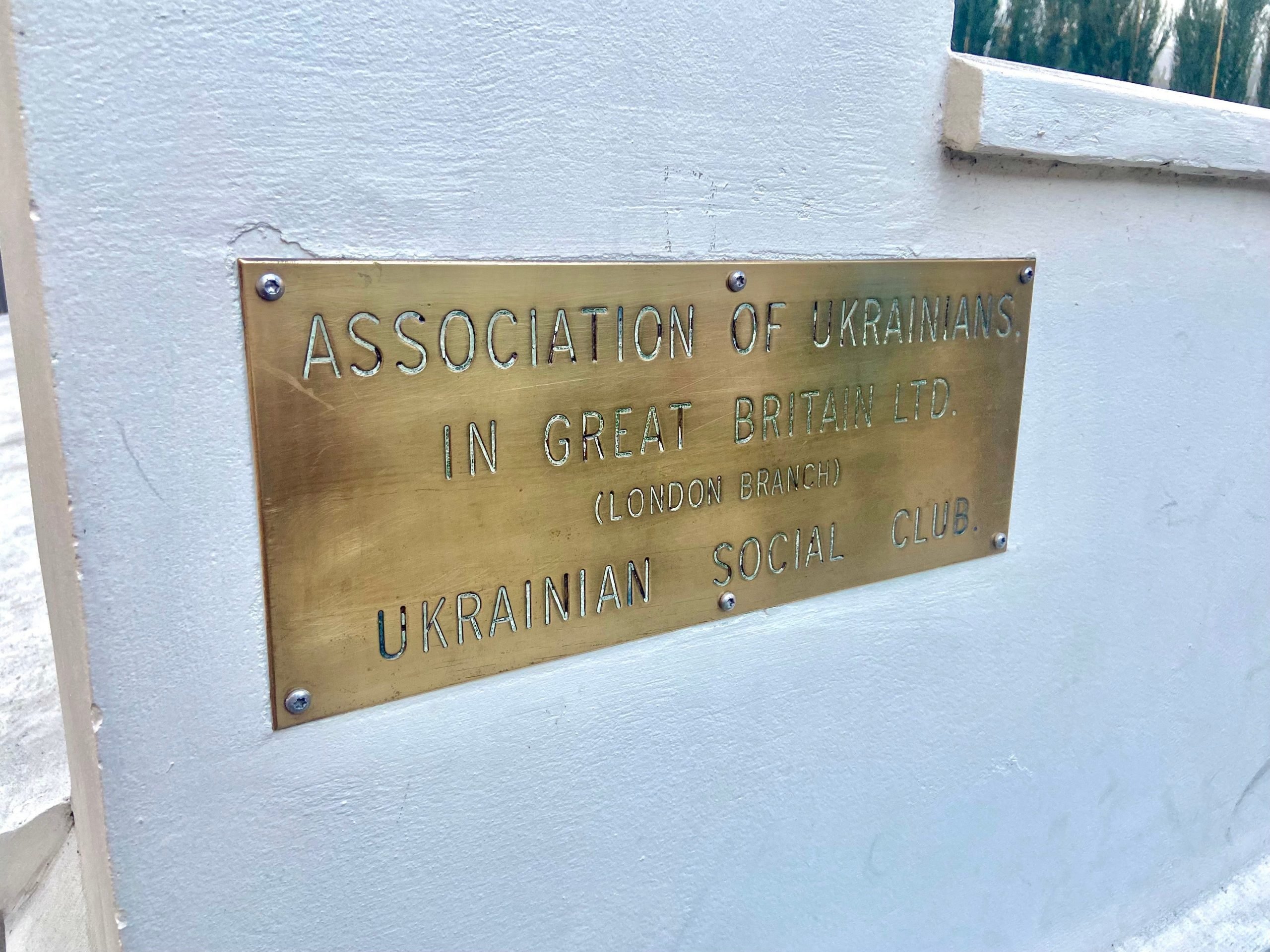 Plaque saying "The Assocation of Ukrainians in Great Britain"