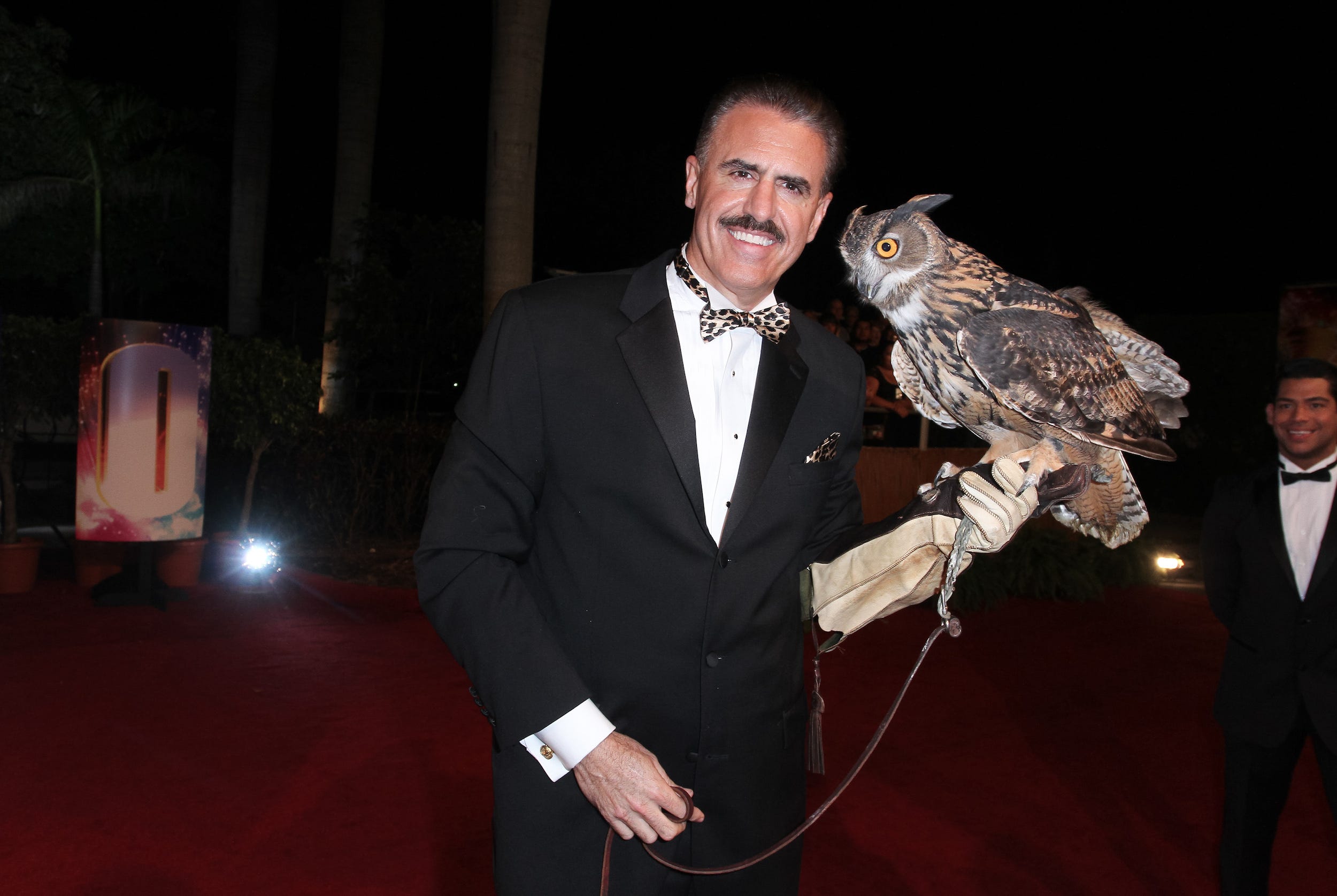 Ron Magill of Zoo Miami holds an owl.