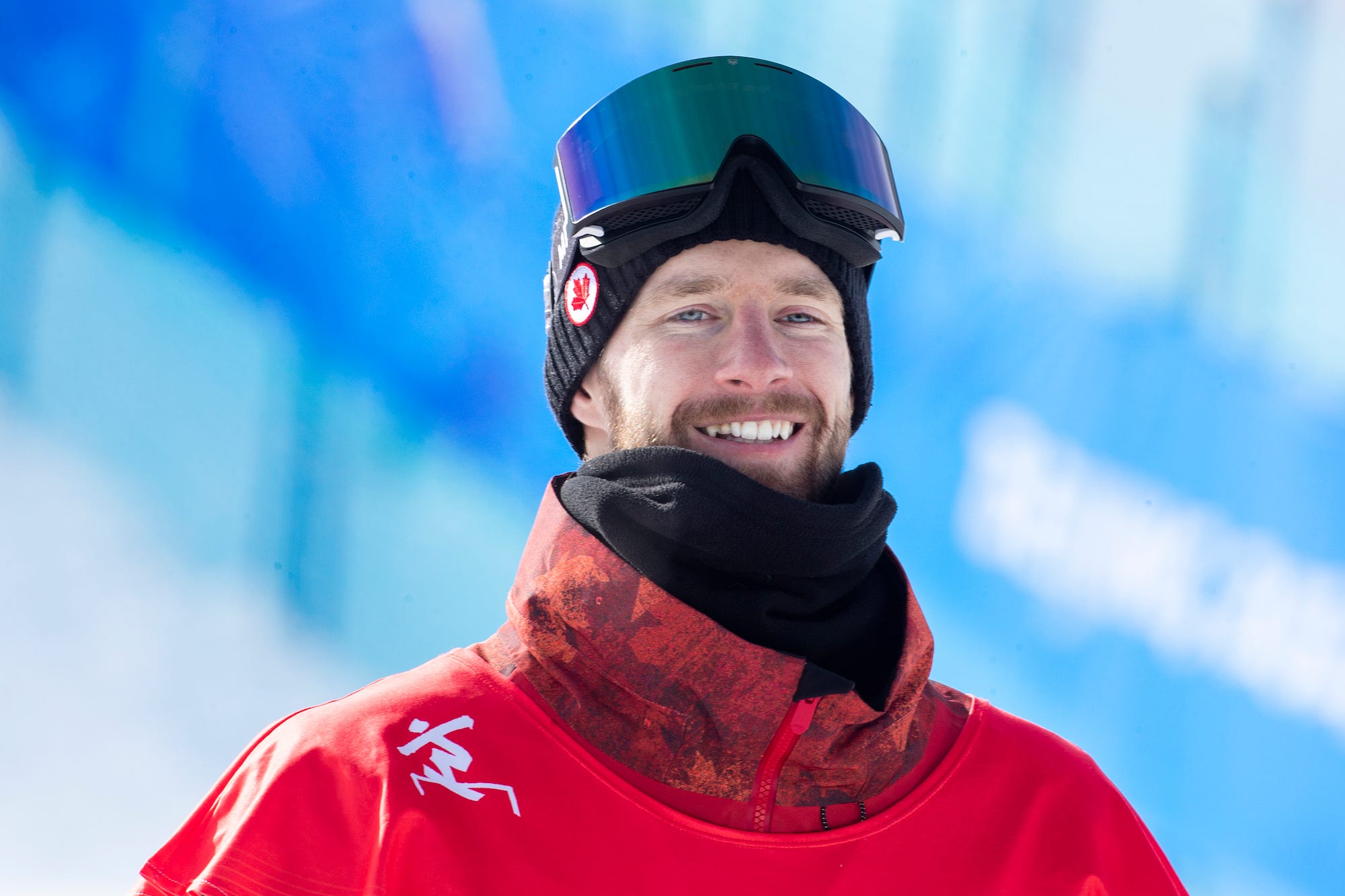 Gold medal winner Max Parrot of Canada on the podium after his victory in the Snowboard Slopestyle Final for Men at Genting Snow Park during the Winter Olympic Games