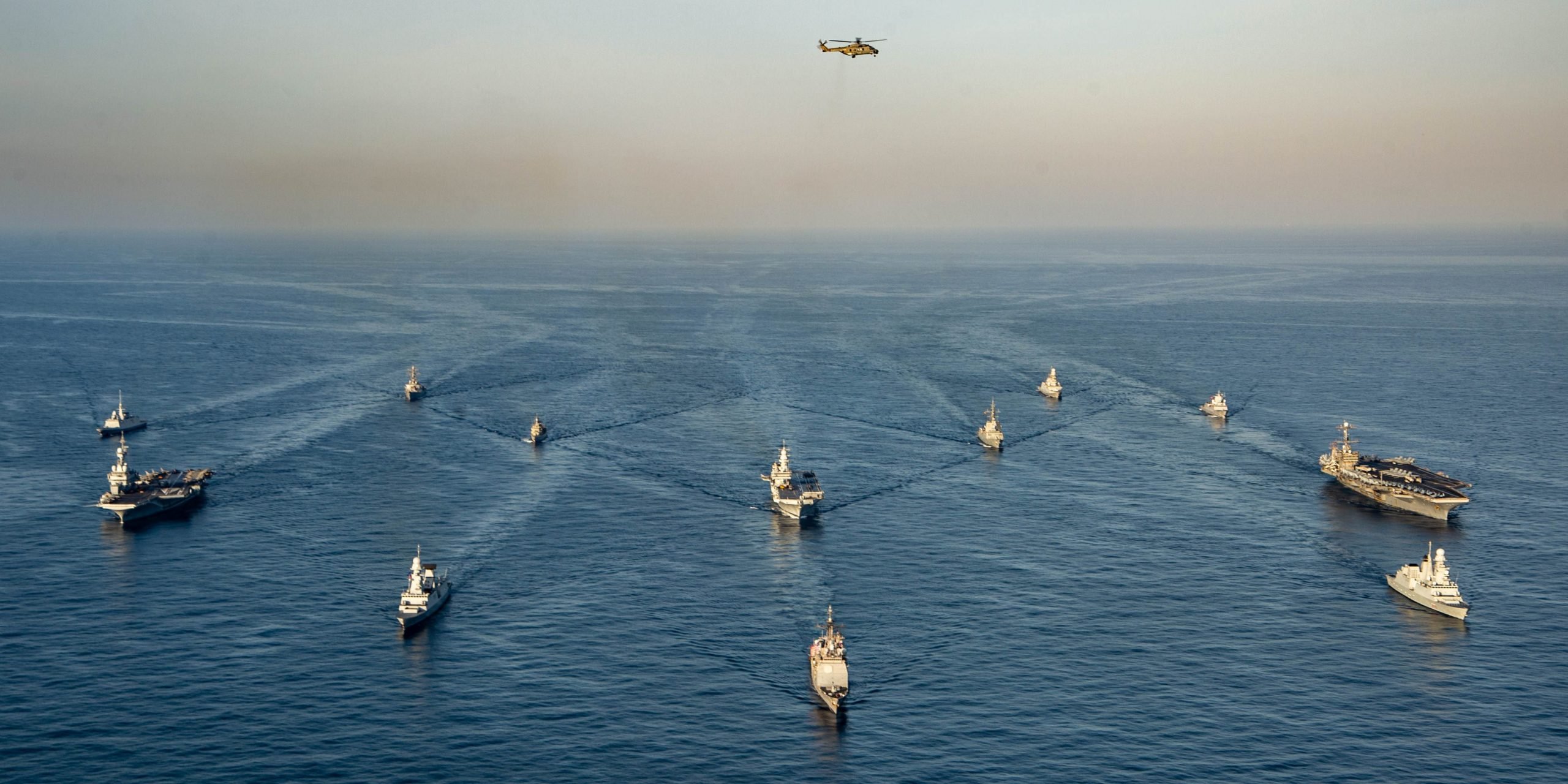 Elements of Carrier Strike Group (CSG) 8, the ITS Cavour Strike Group and the Charles de Gaulle Carrier Strike Group (TF 473) transit the Mediterranean Sea in formation, Feb. 6, 2022.