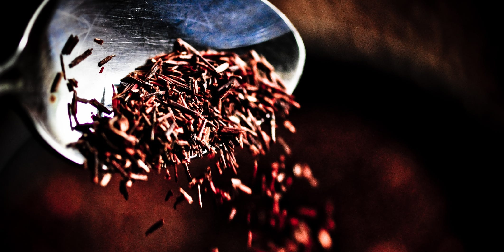 A spoonful of dried rooibos tea.