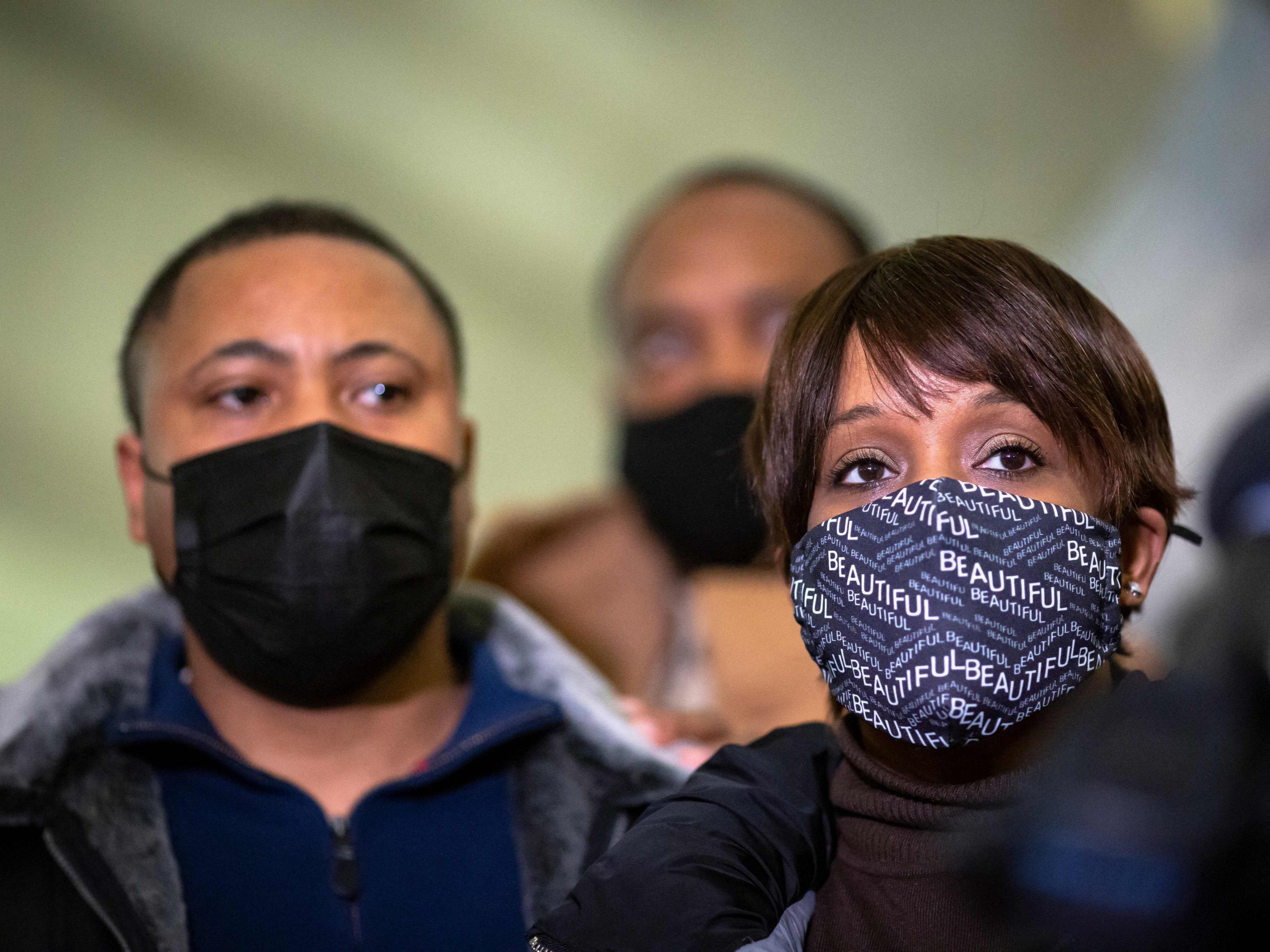 Amir Locke's parents Andre Locke and Karen Wells look on during a press conference at City Hall in Minneapolis, Minnesota, on February 4, 2022