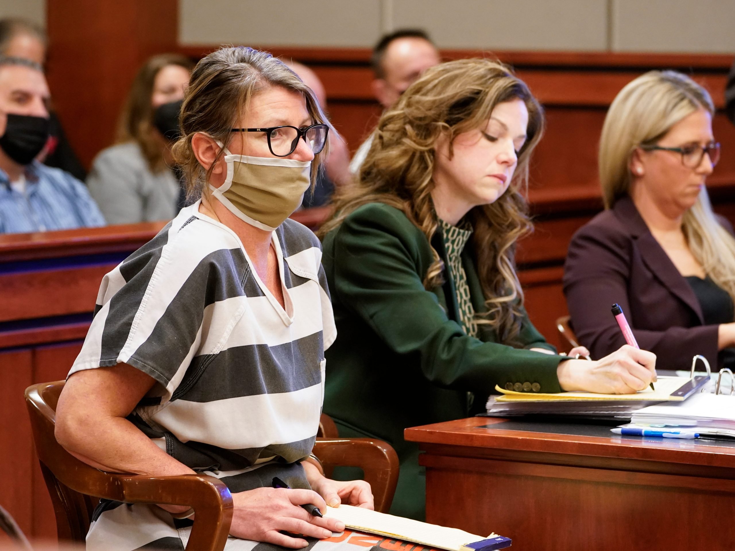 Jennifer Crumbley, mother of Ethan Crumbley, a teenager accused of killing four students in a shooting at Oxford High School, appears in court for a preliminary examination on involuntary manslaughter charges in Rochester Hills, Mich., Tuesday, Feb. 8, 2022.