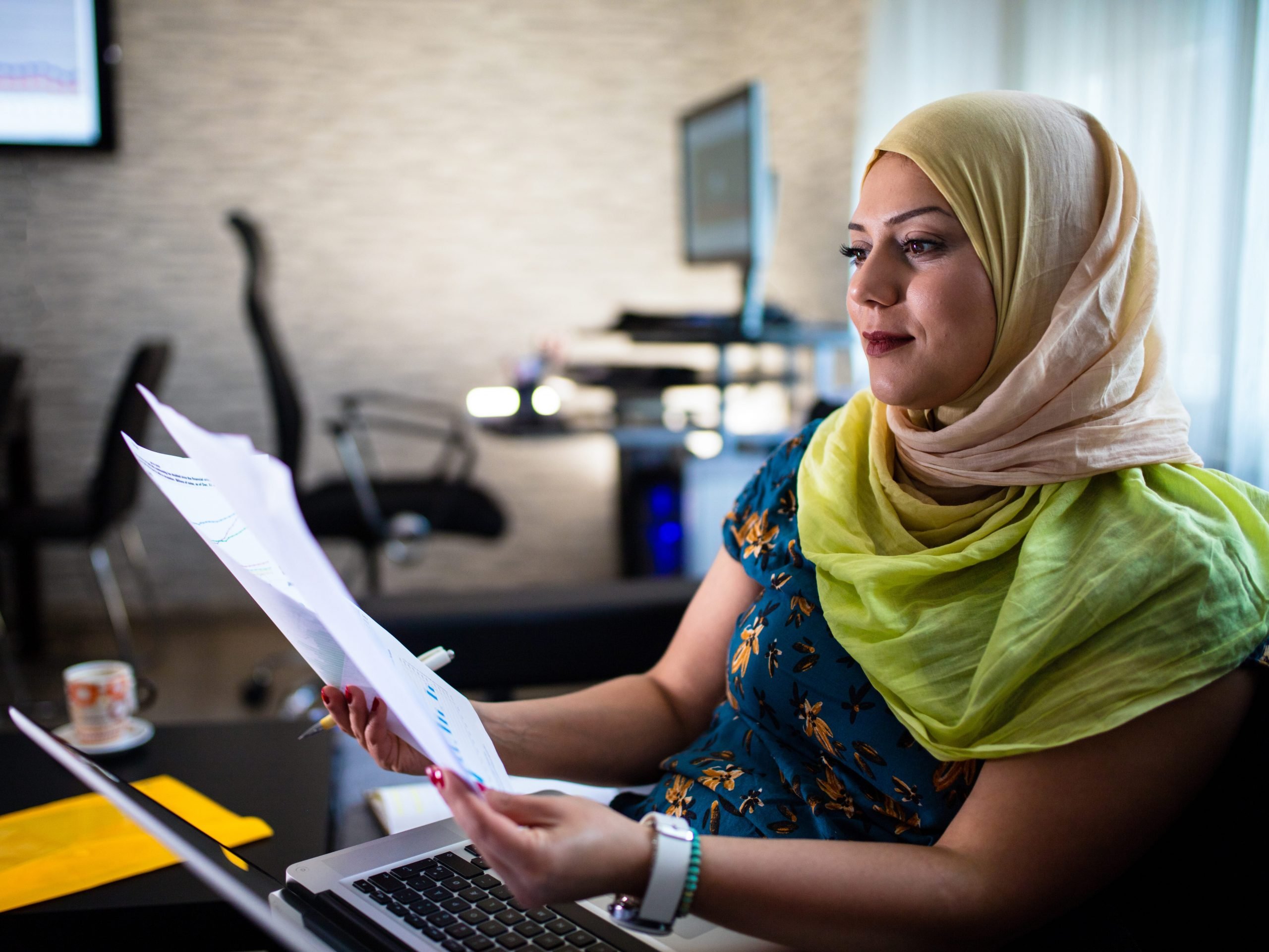 woman reading papers