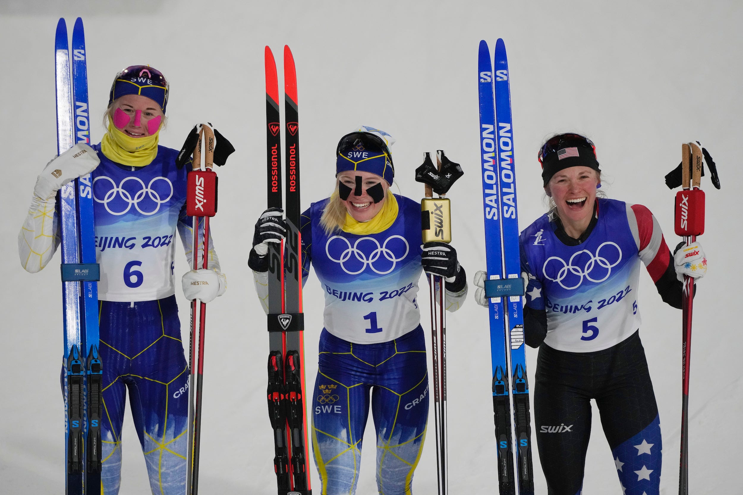 Podium members from the women's final sprint free cross-country skiing competition at the 2022 Winter Olympics.