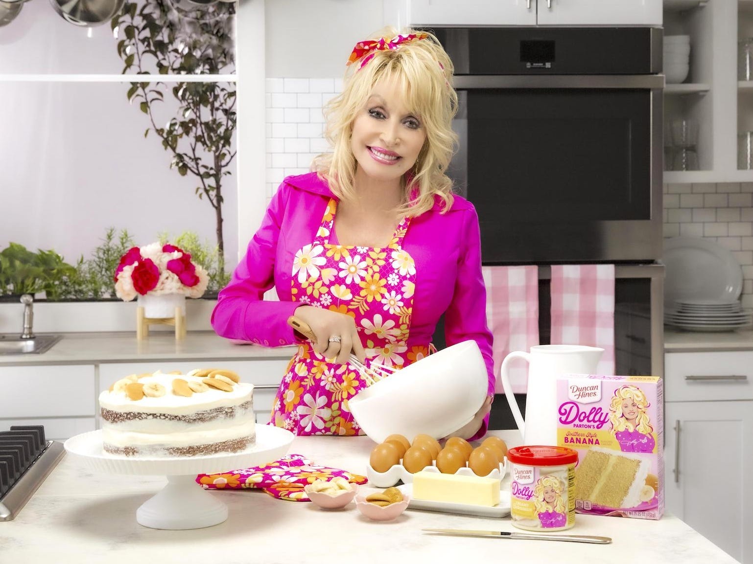 Dolly Parton with Duncan Hines products