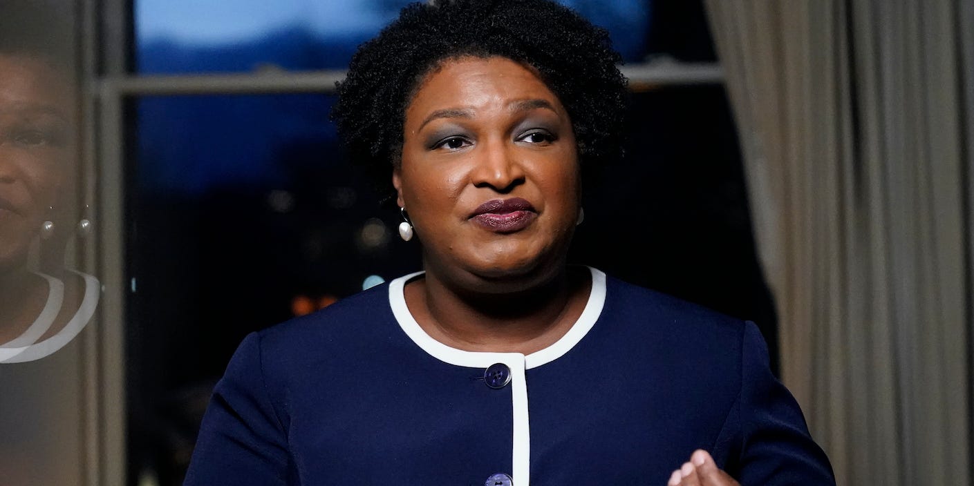 Georgia gubernatorial Democratic candidate Stacey Abrams speaks during an interview with The Associated Press on Thursday, Dec. 16, 2021, in Decatur, Ga