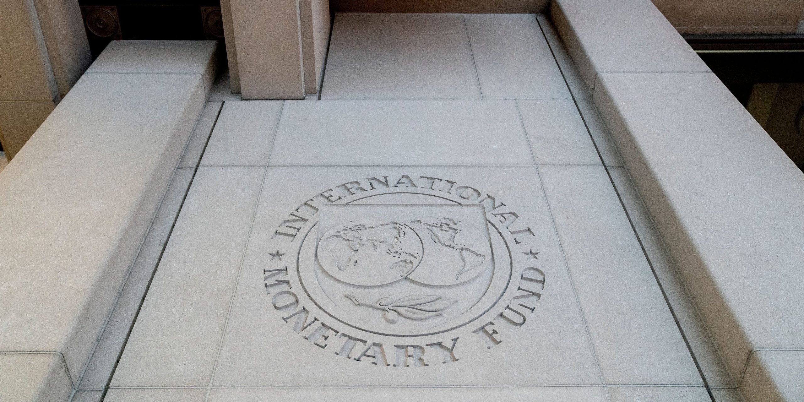The seal for the International Monetary Fund is seen in Washington, DC on January 10, 2022.