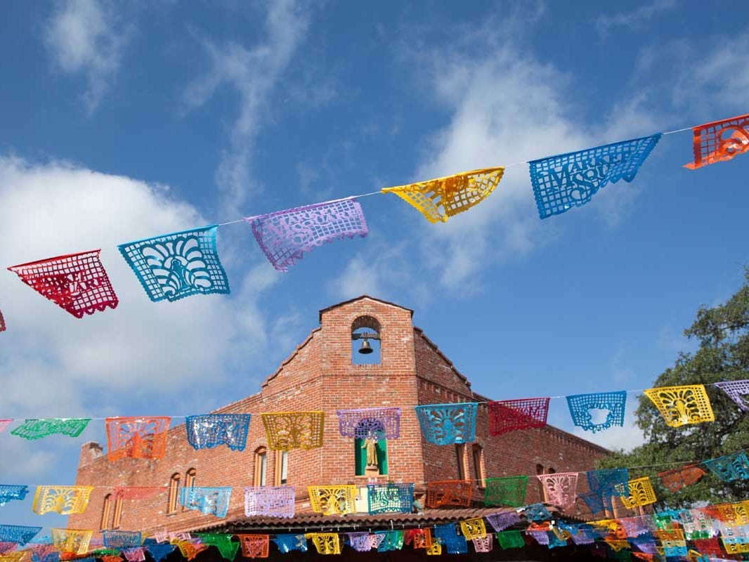 Market Square with colorful flags in San Antonio, Texas.