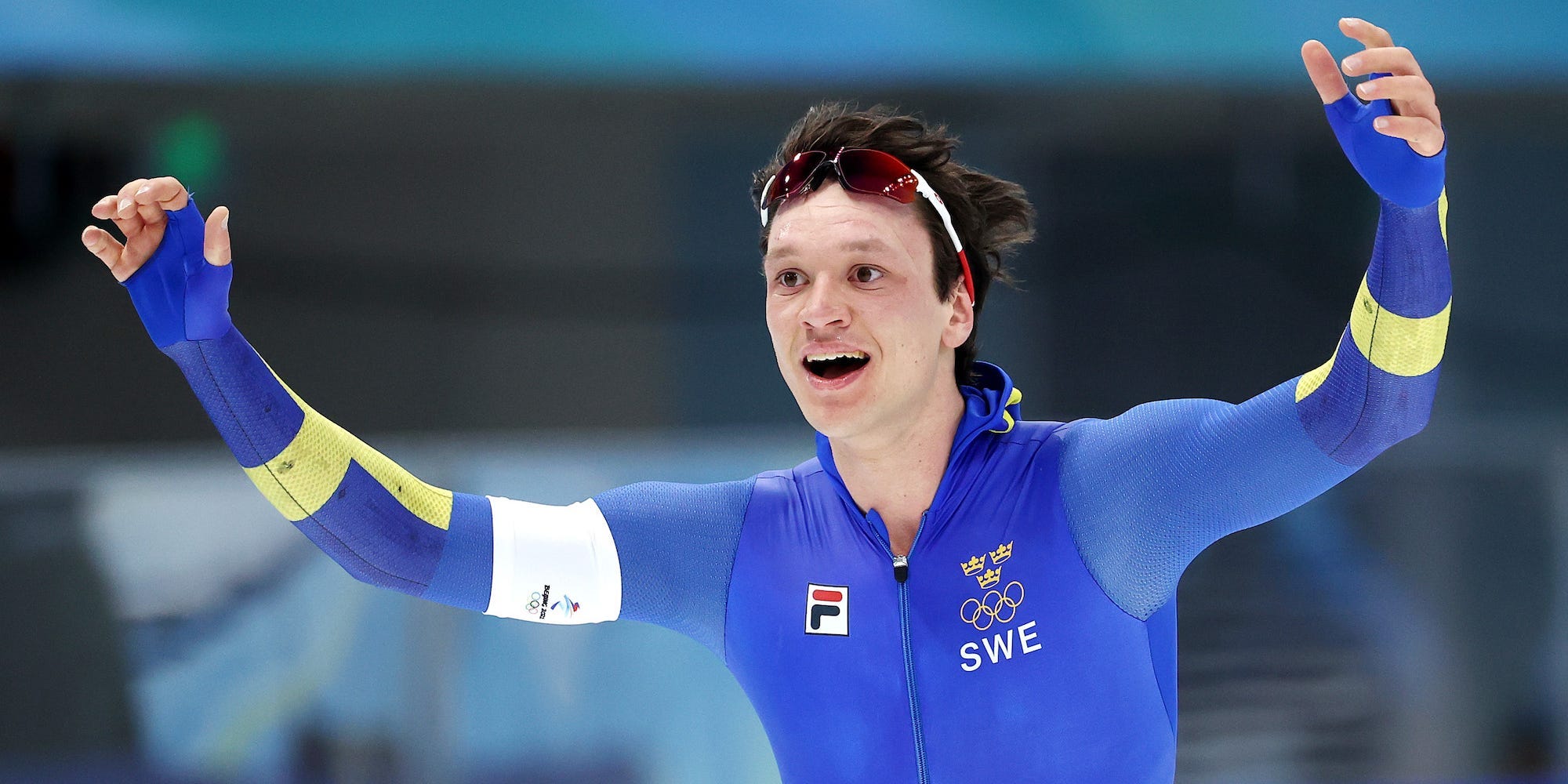 Nils van der Poel reacts after winning the gold medal in the 5,000 meter speed skate.