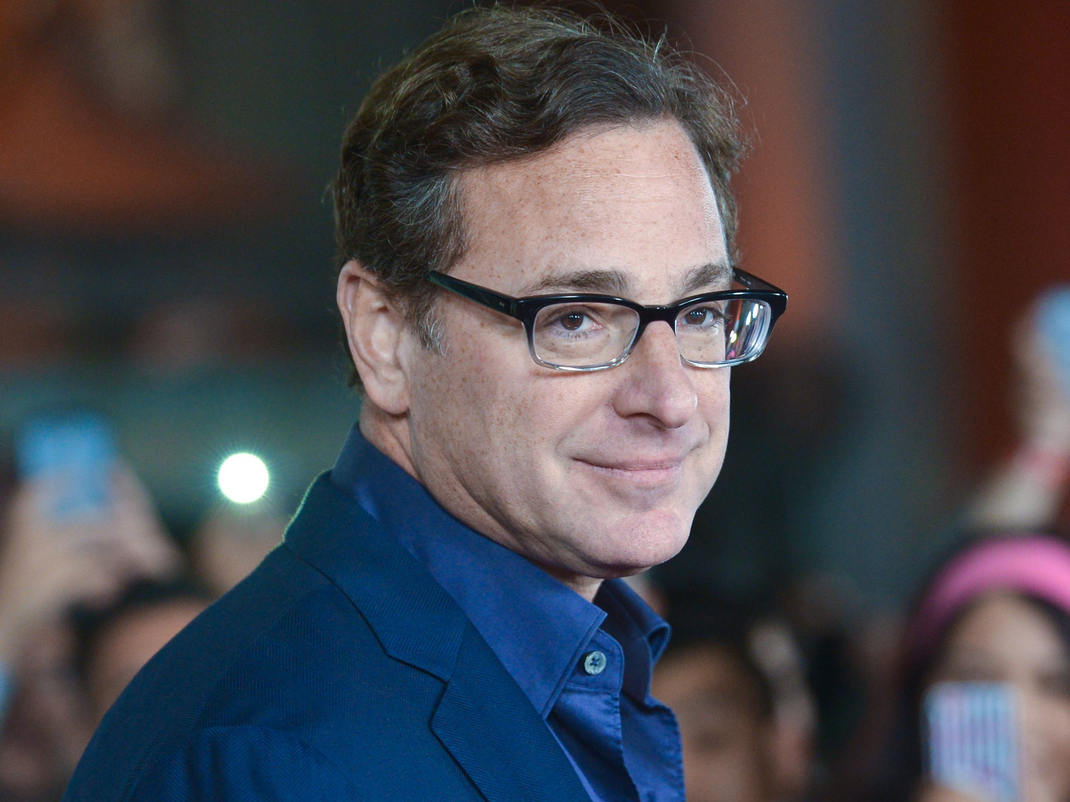 Bob Saget arrives at the premiere of "Jackass Presents Bad Grandpa" at the TCL Chinese Theatre on Wednesday, Oct. 23, 2013 in Los Angeles.