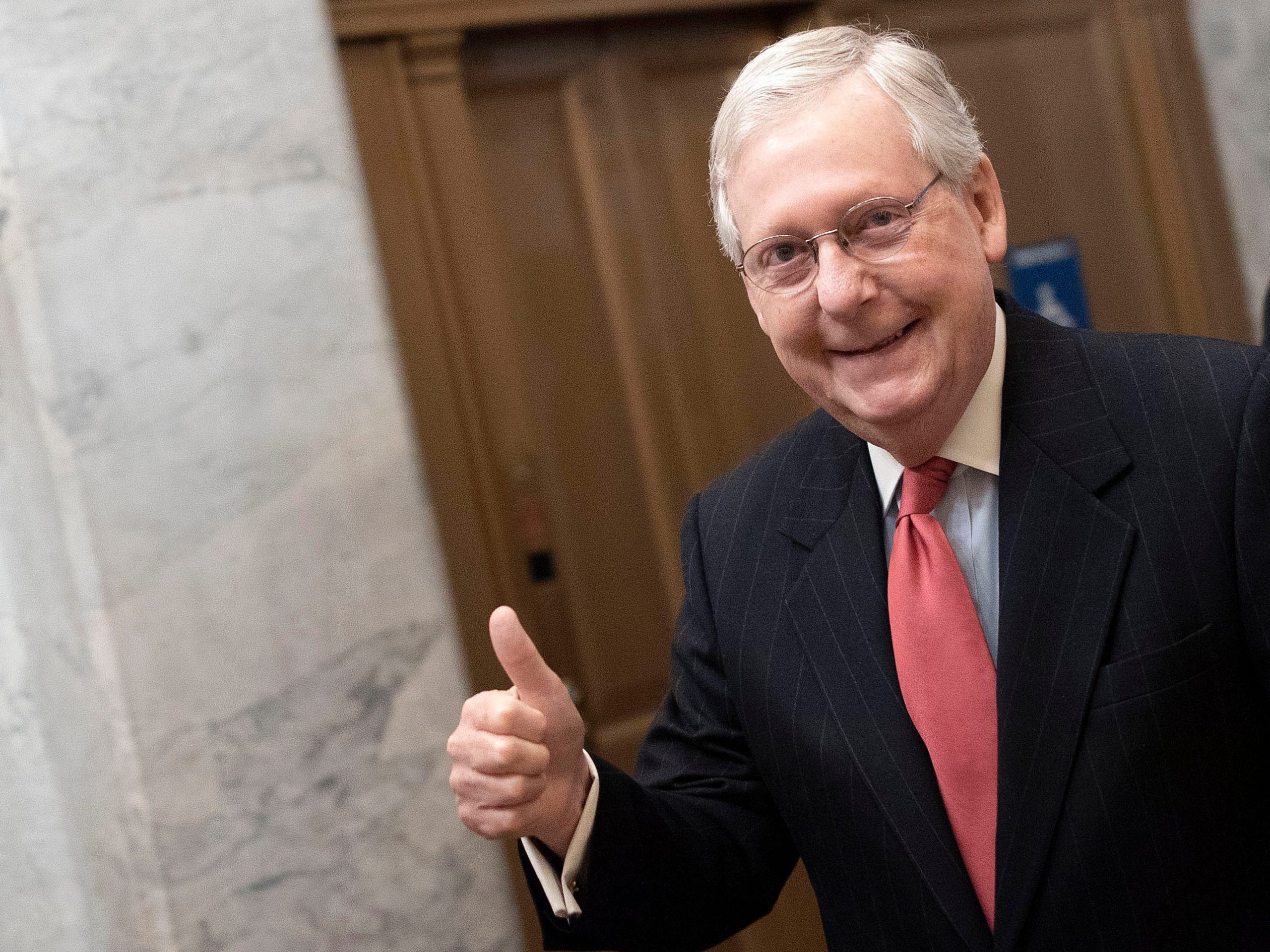 U.S. Senate Majority Leader Mitch McConnell (R-KY) gives a thumbs up sign as he arrives at the U.S. Capitol on March 25, 2020 in Washington, DC.