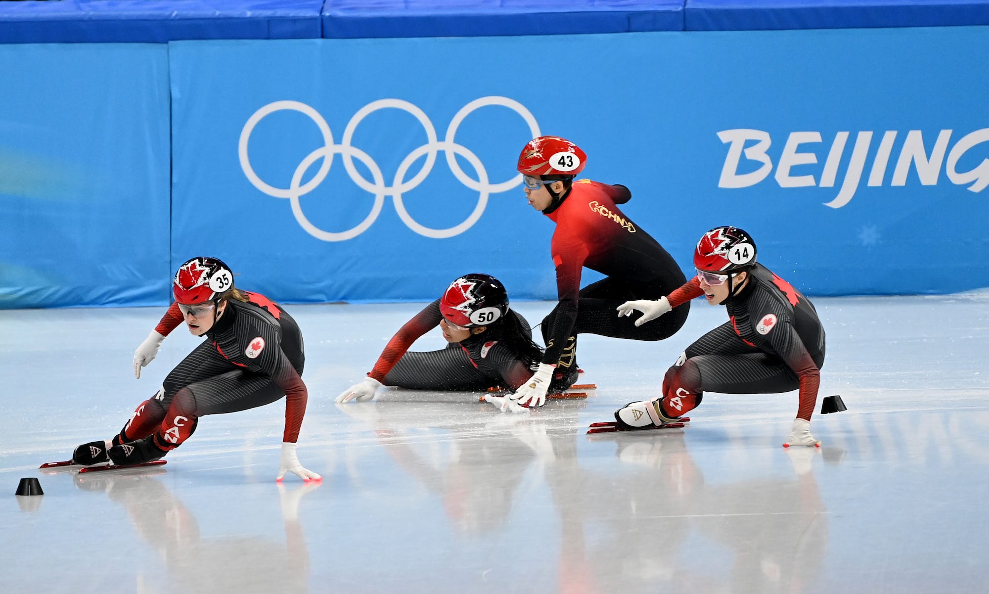 Team China competes during the Women's Short Track Speed Skating 500m Quarterfinals on day three of the Beijing 2022 Winter Olympic Games at Capital Indoor Stadium