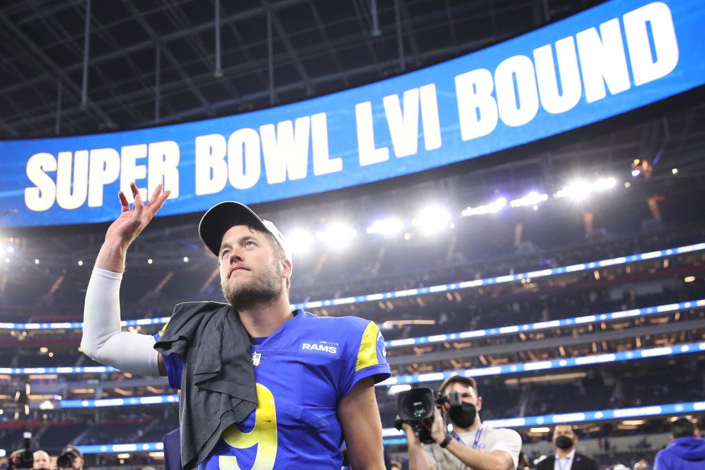 Matthew Stafford #9 of the Los Angeles Rams reacts after defeating the San Francisco 49ers in the NFC Championship Game at SoFi Stadium