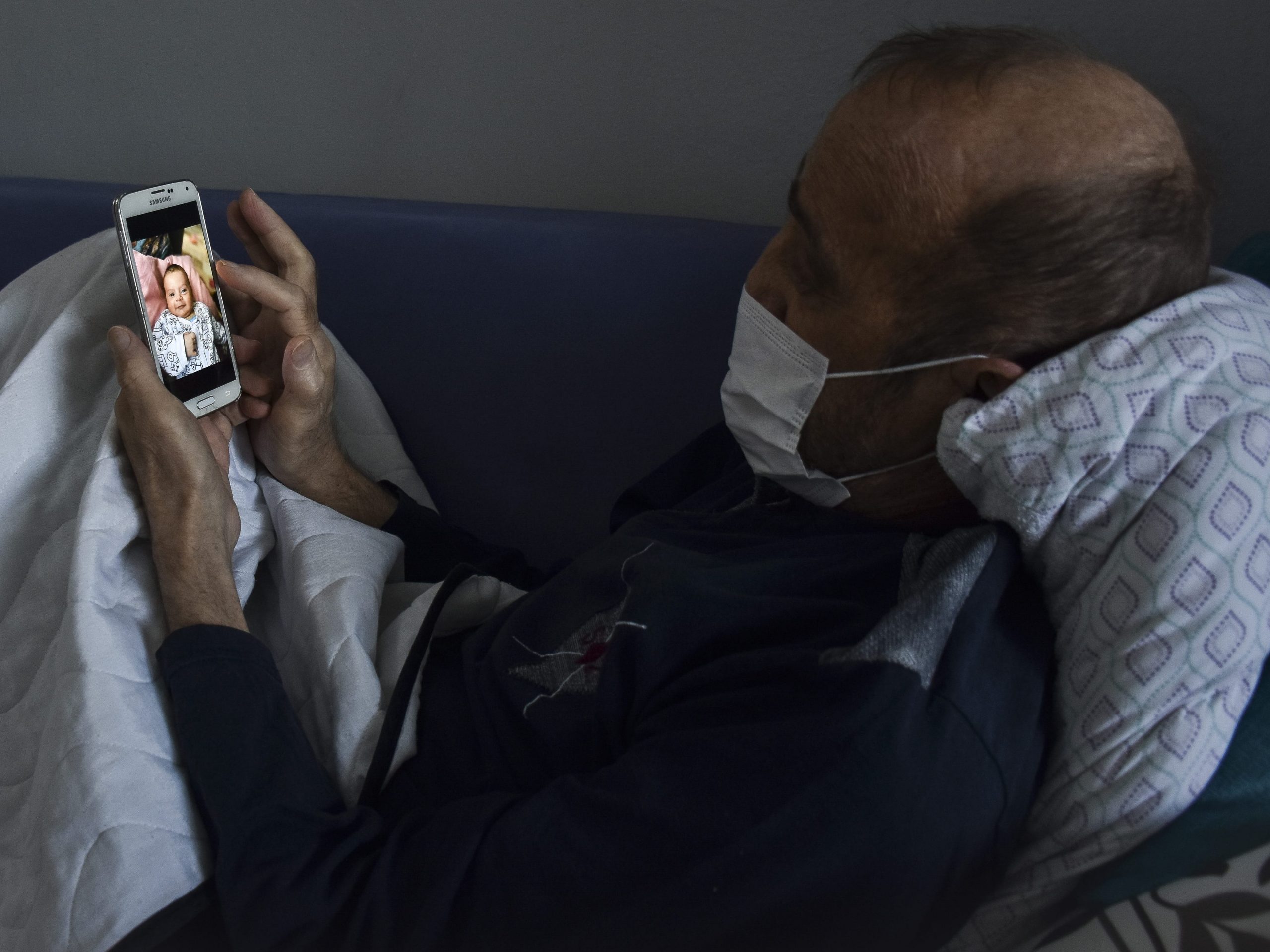 Muzzafer Kayasan FaceTimes his grandchildren.