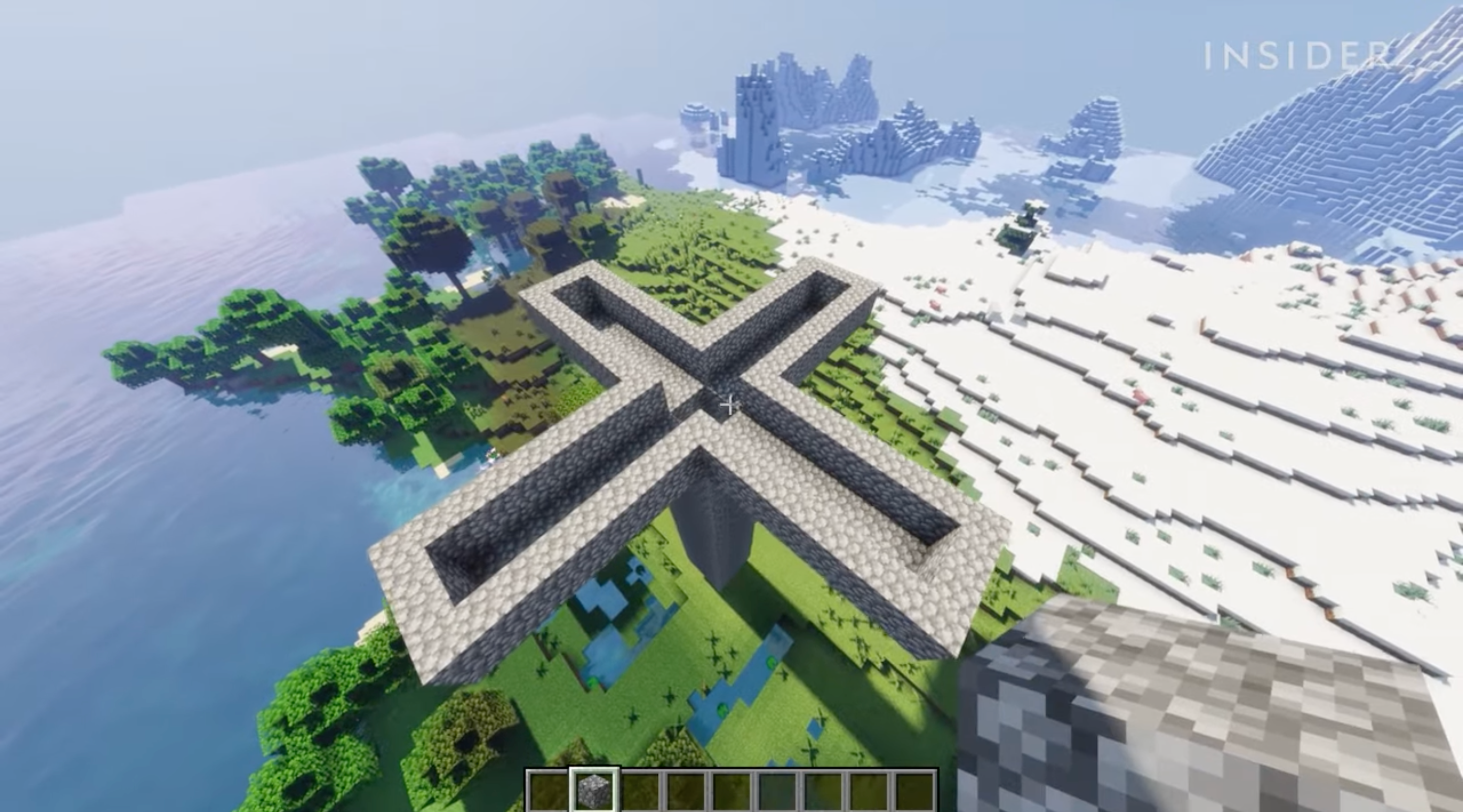A screenshot from Minecraft, showing the completed mob farm well and bridges.