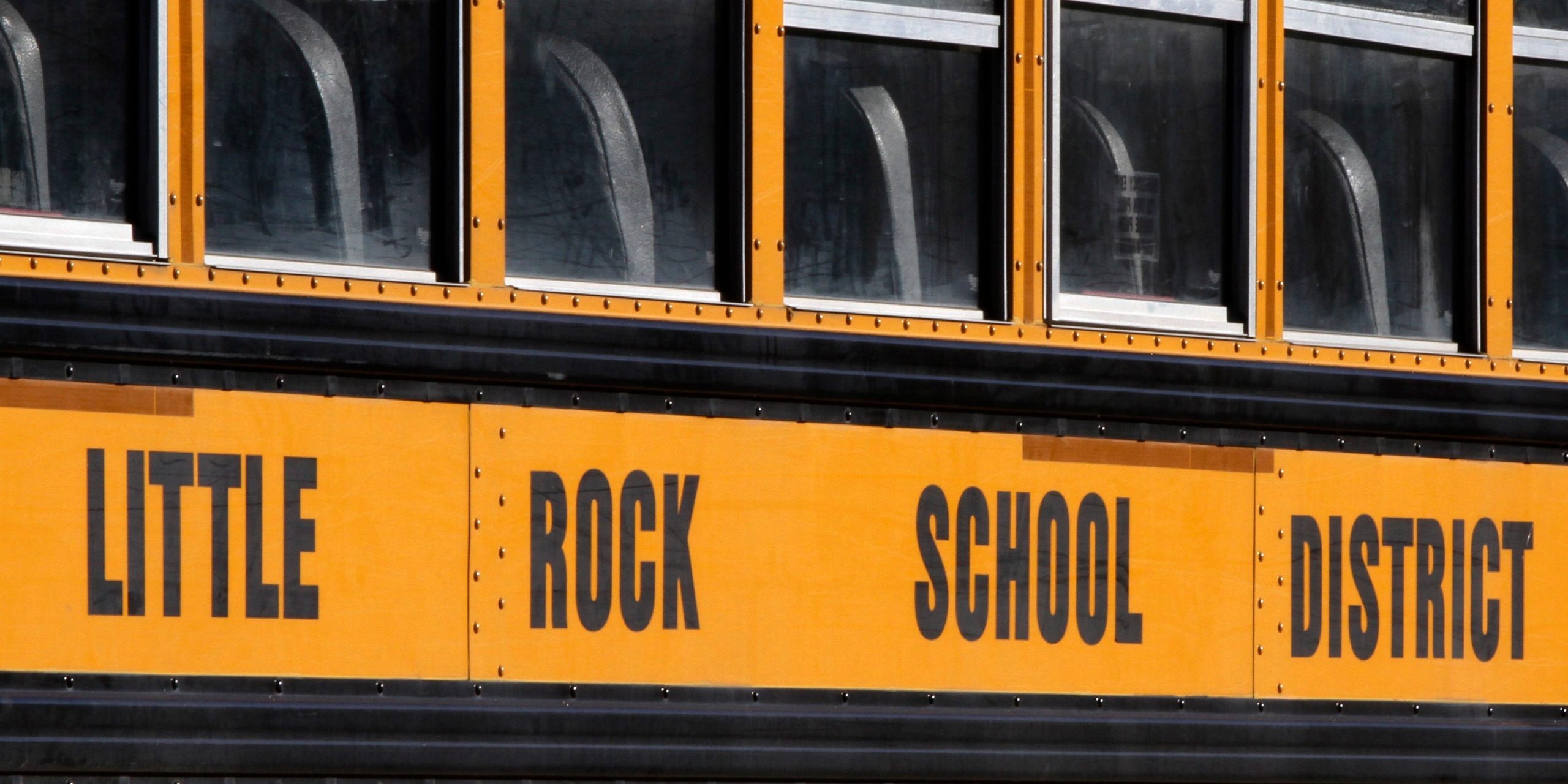 A closeup photo of a Little Rock School District school bus.