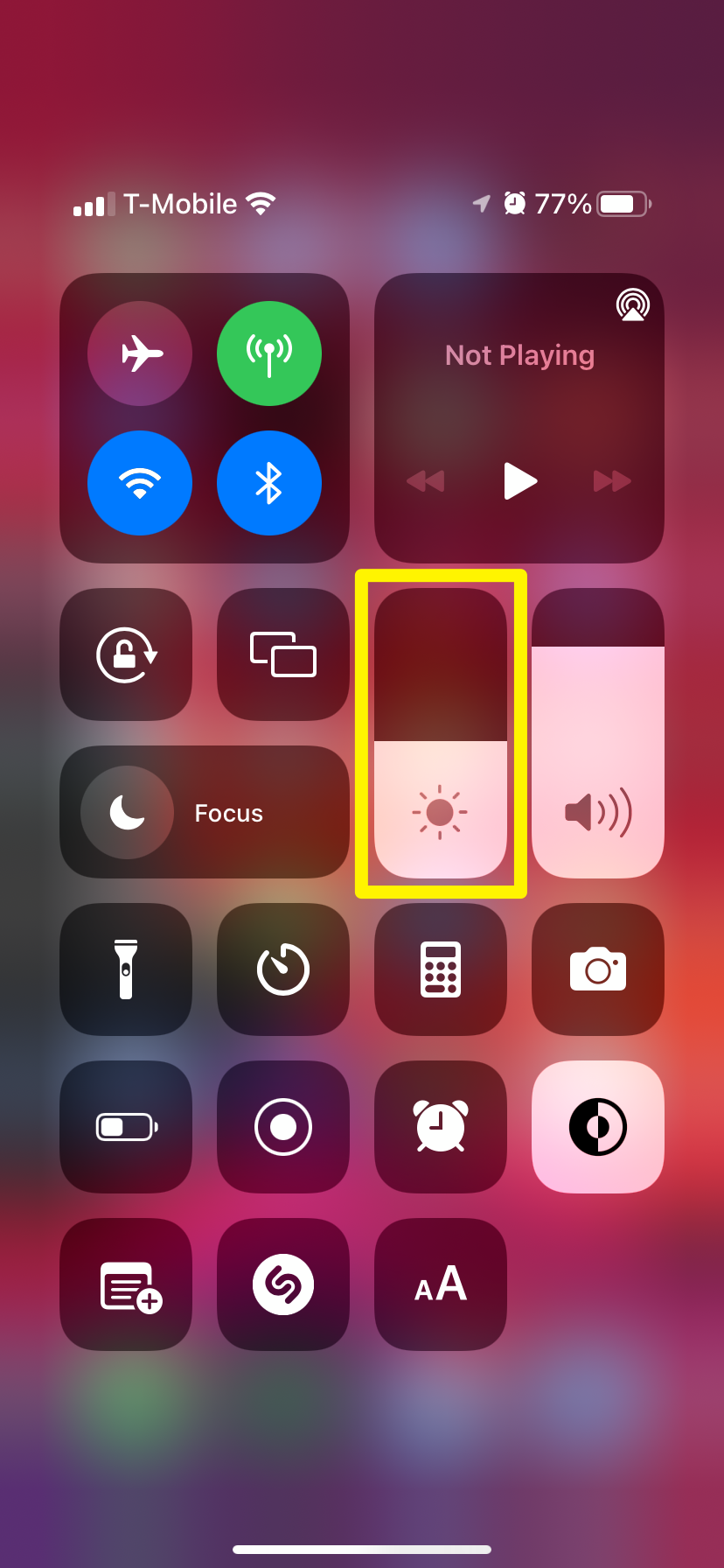 The Control Center on an iPhone. The brightness meter is highlighted.