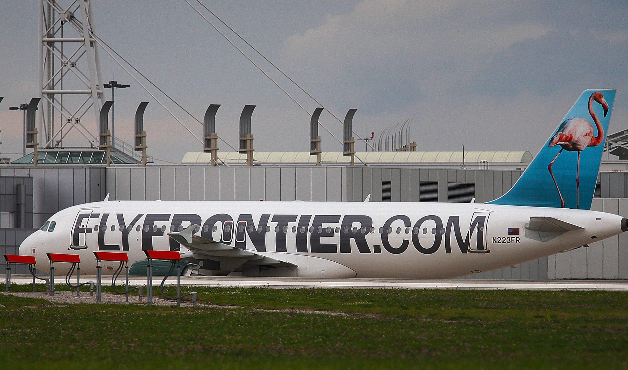 A Frontier Airlines plane on the runway at Cleveland Hopkins Airport.