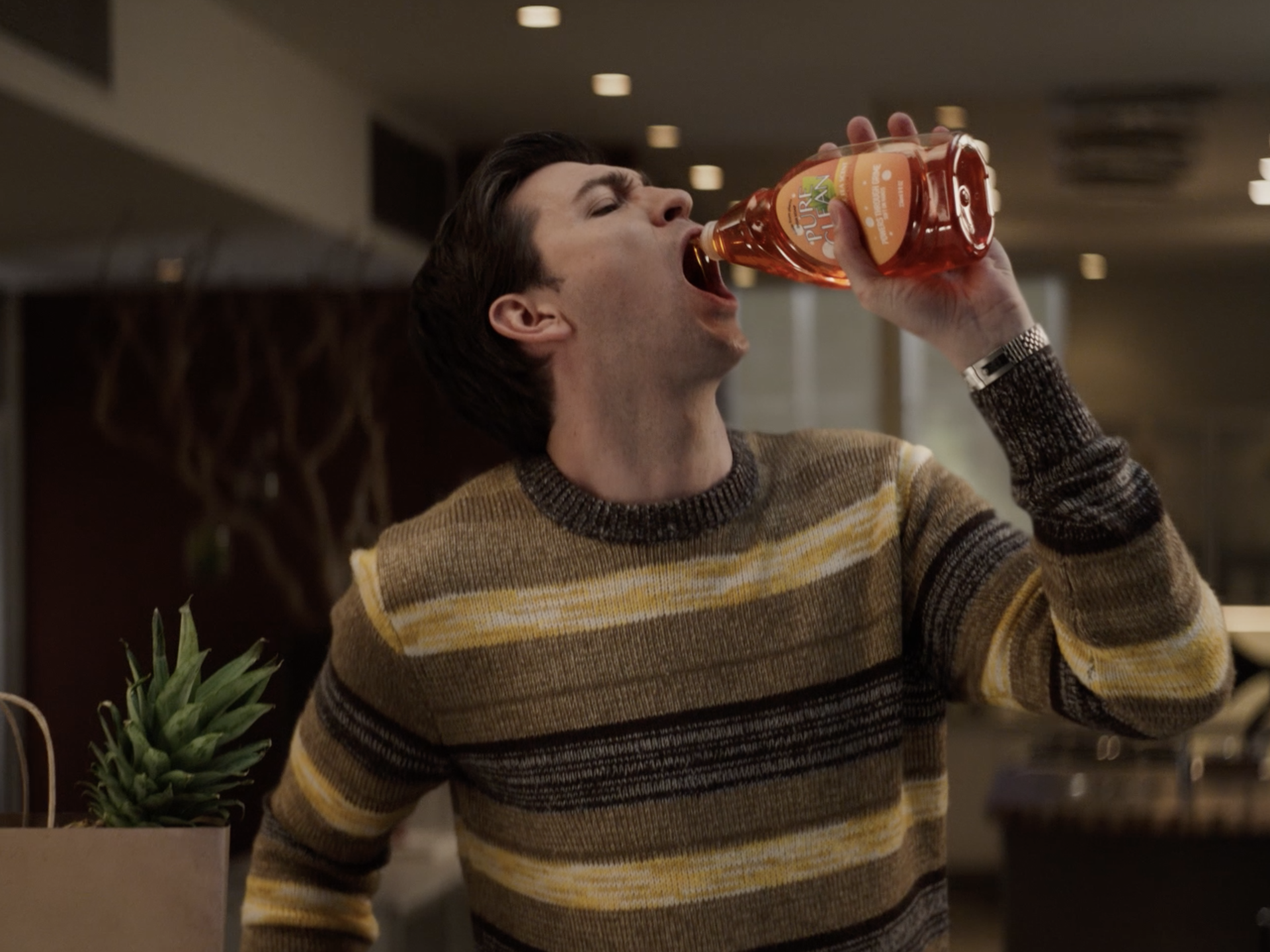 Nicholas Braun eating dish soap in an UberEats ad.